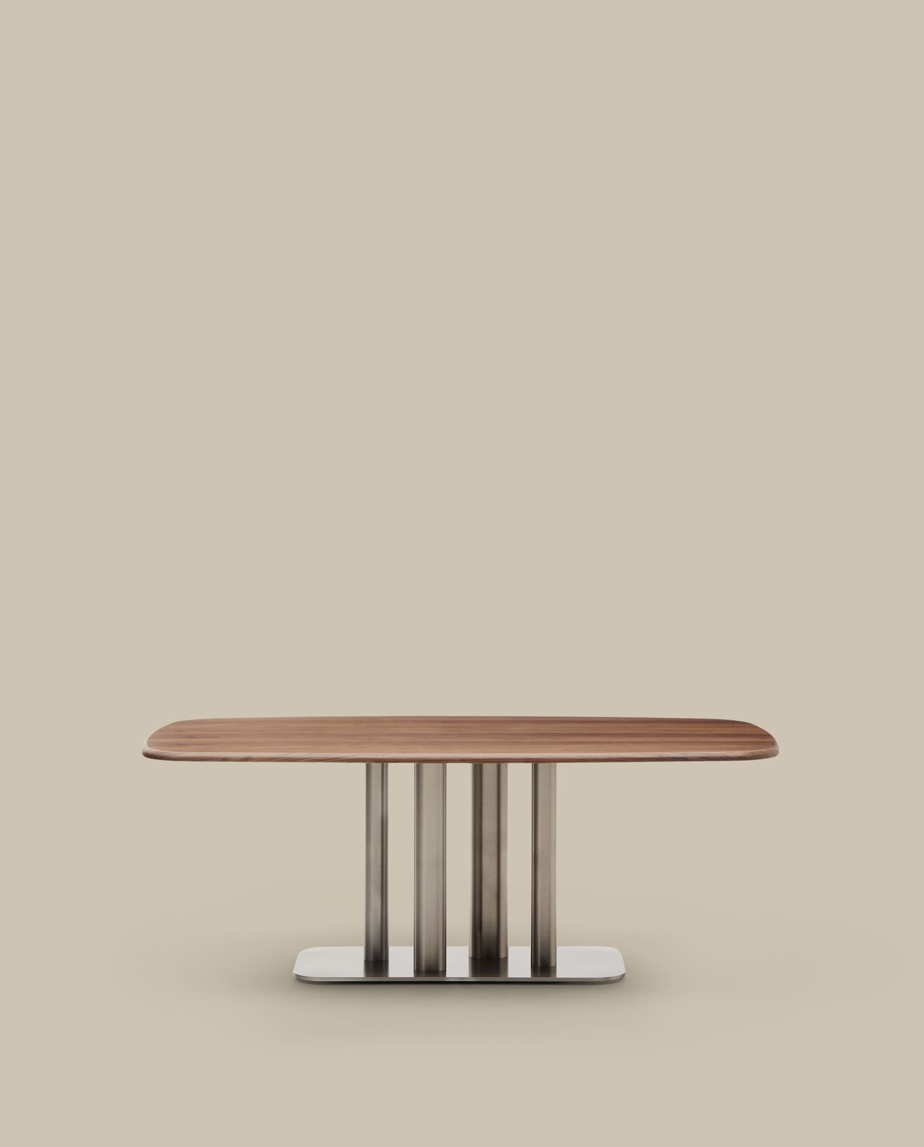 Melvar table made from walnut veneer and legs with brushed stainless steel base 180 x 100cm