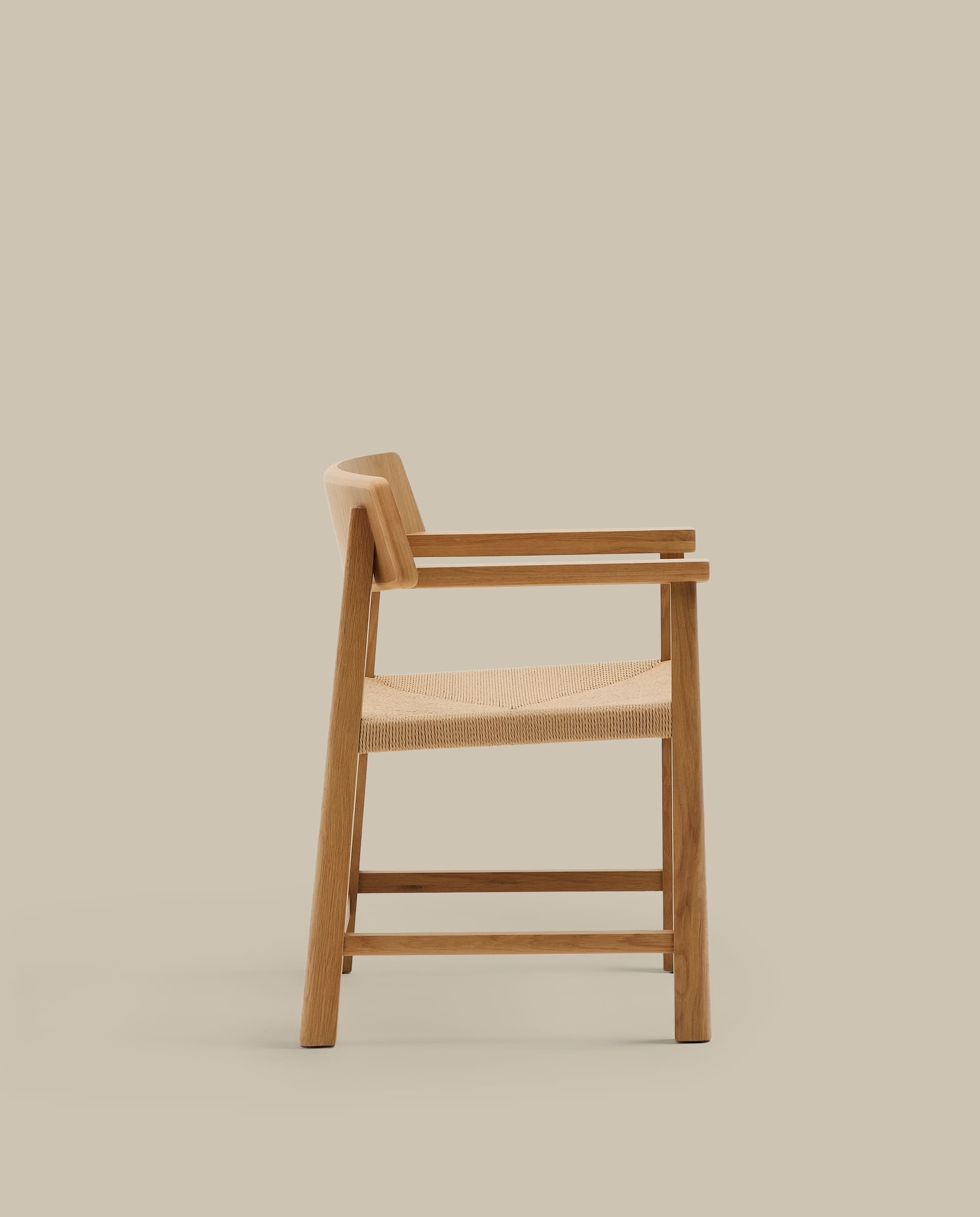 Idun chair made of FSC Mix Credit solid oak wood with natural tone finish and rope cord seat