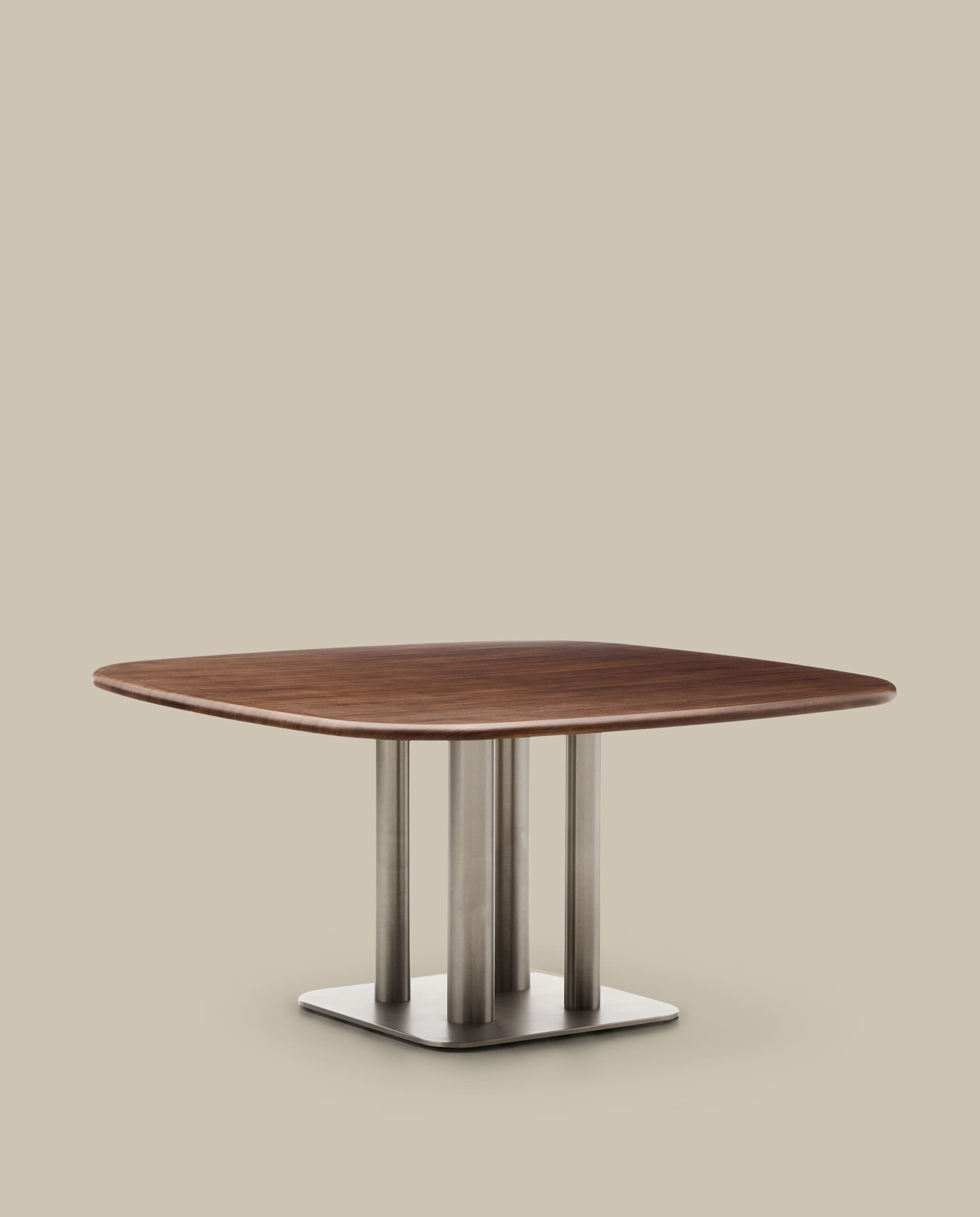 Melvar table made from walnut veneer and legs with brushed stainless steel base 150 x 150cm