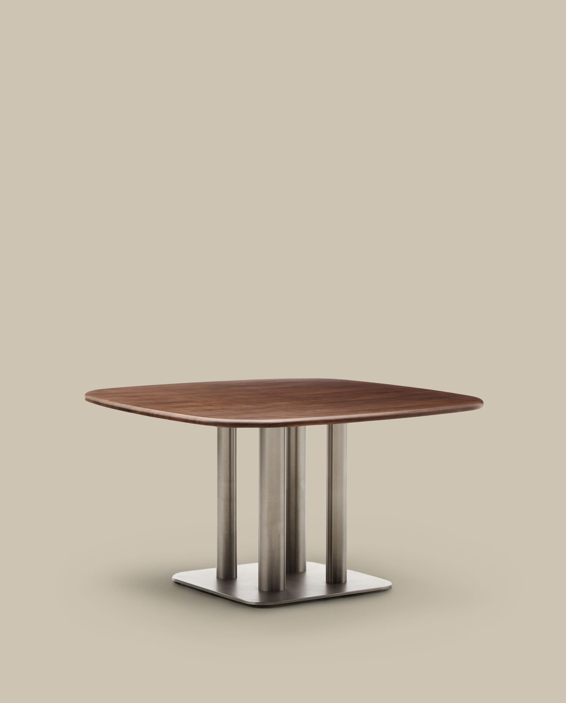 Melvar table made from walnut veneer and legs with brushed stainless steel base 121 x 121cm