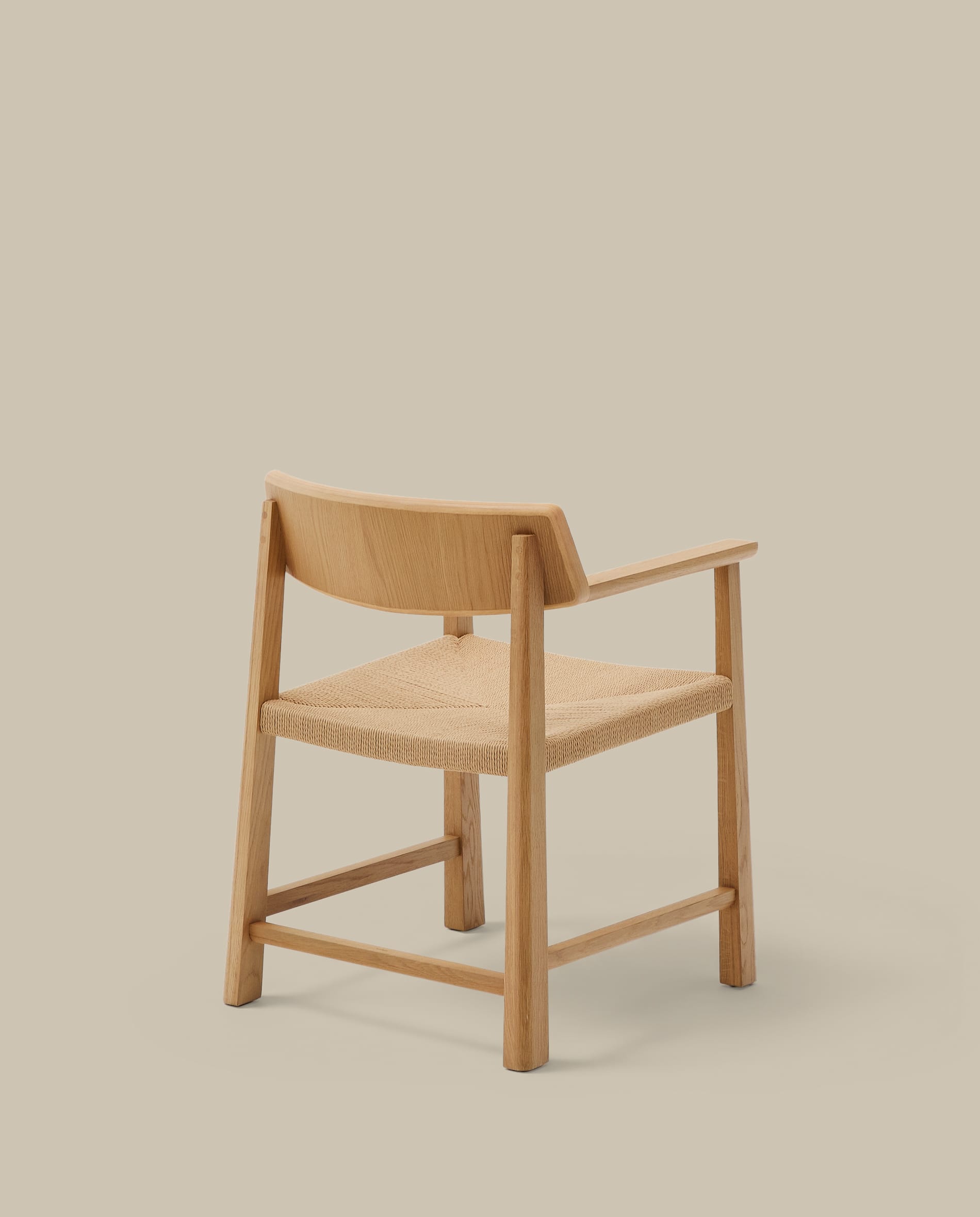 Idun chair made of FSC Mix Credit solid oak wood with natural tone finish and rope cord seat
