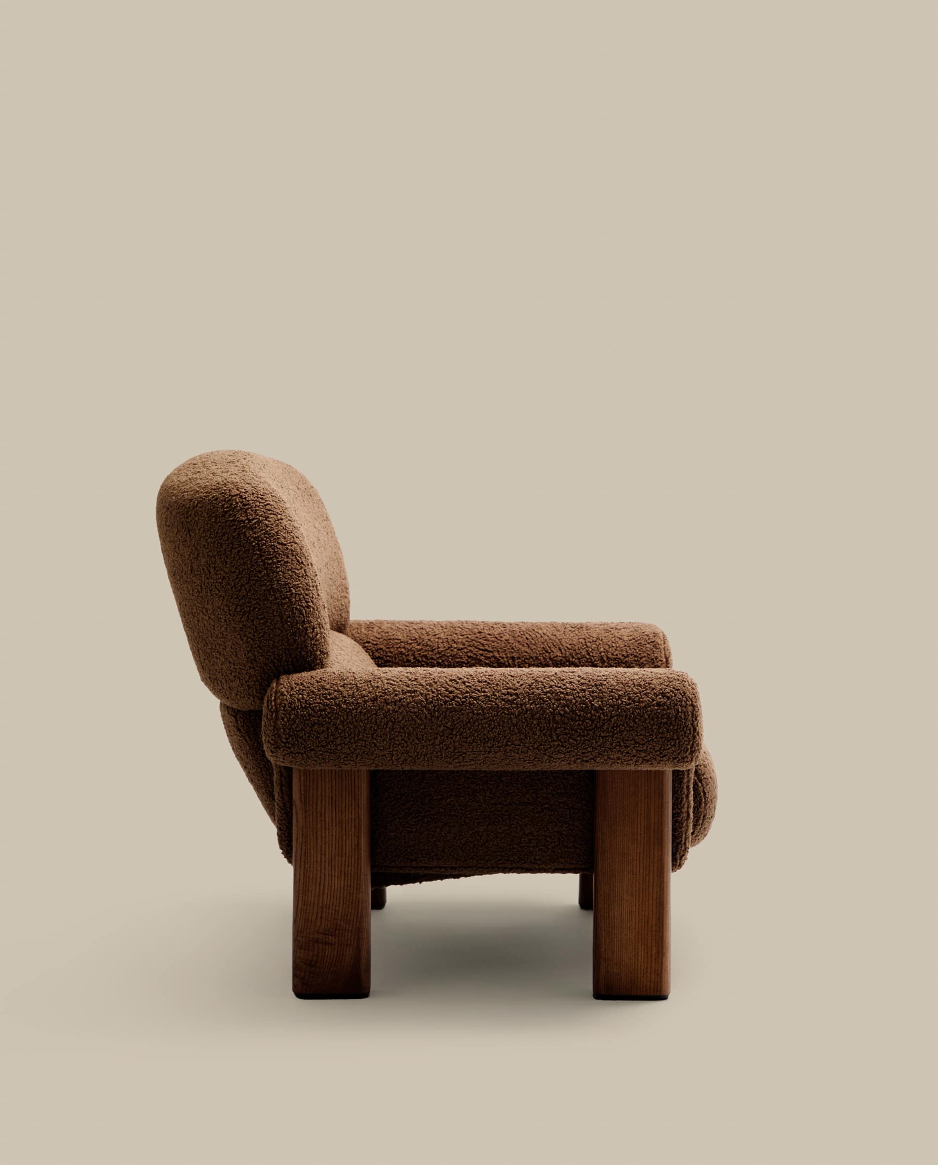 Nema armchair in taupe bouclé with solid ash wood legs in a walnut finish FSC 100%