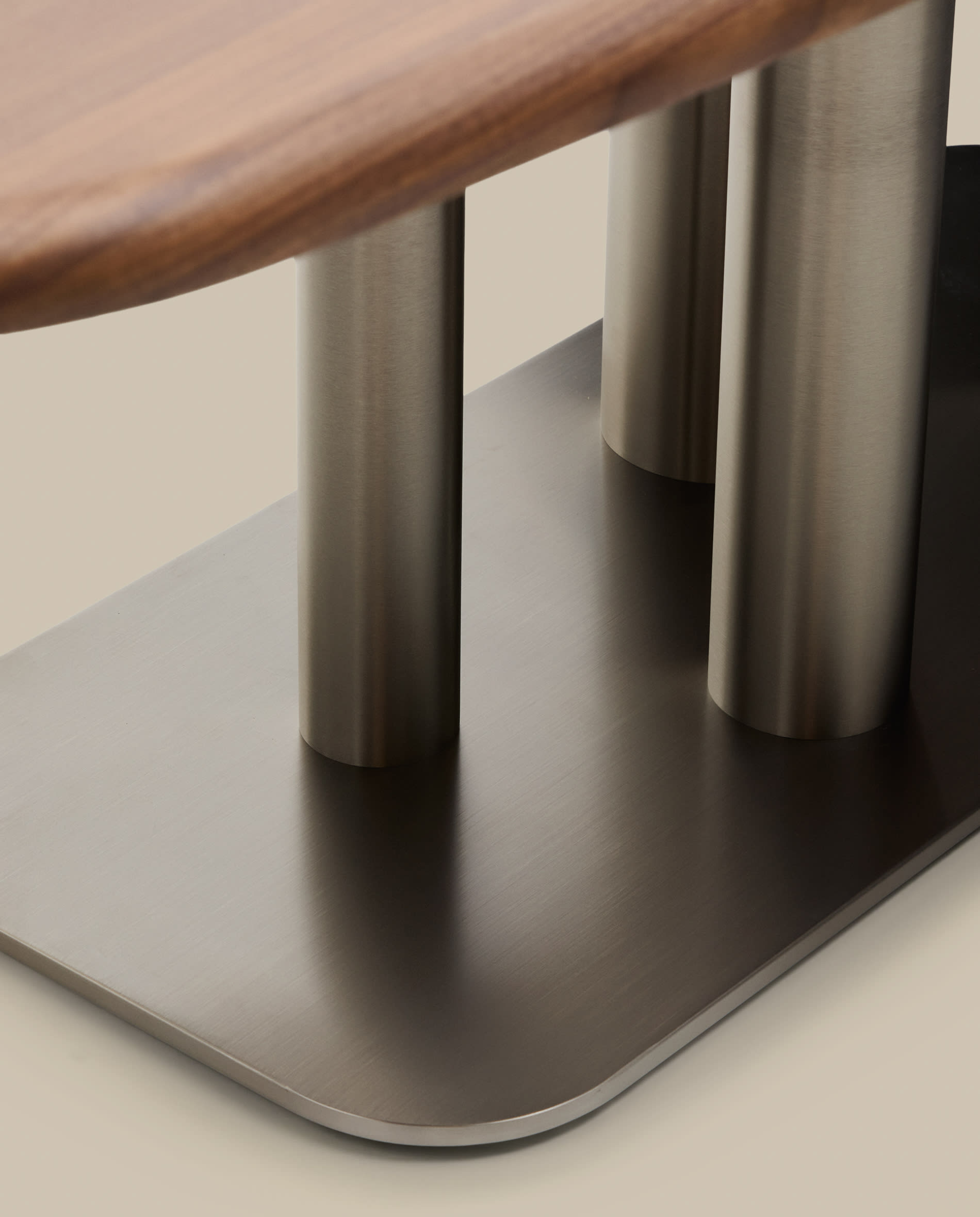 Melvar table made from walnut veneer and legs with brushed stainless steel base 180 x 100cm