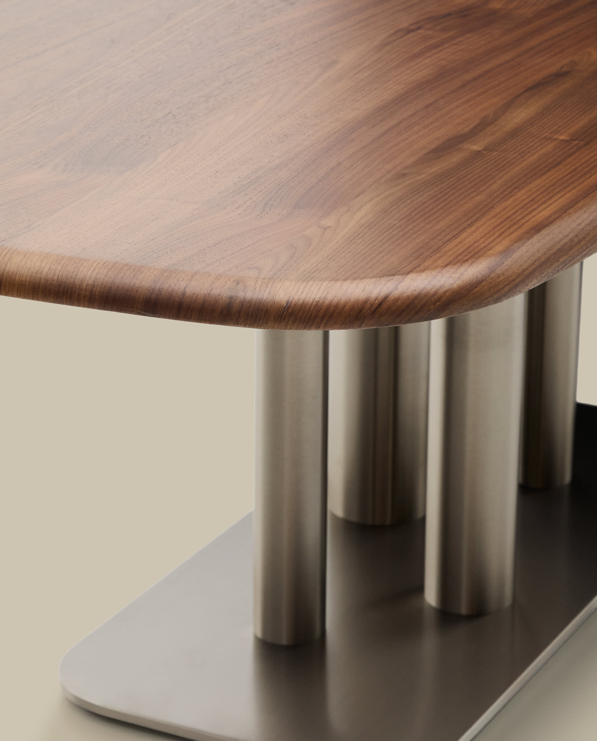 Melvar table made from walnut veneer and legs with brushed stainless steel base 220 x 110cm