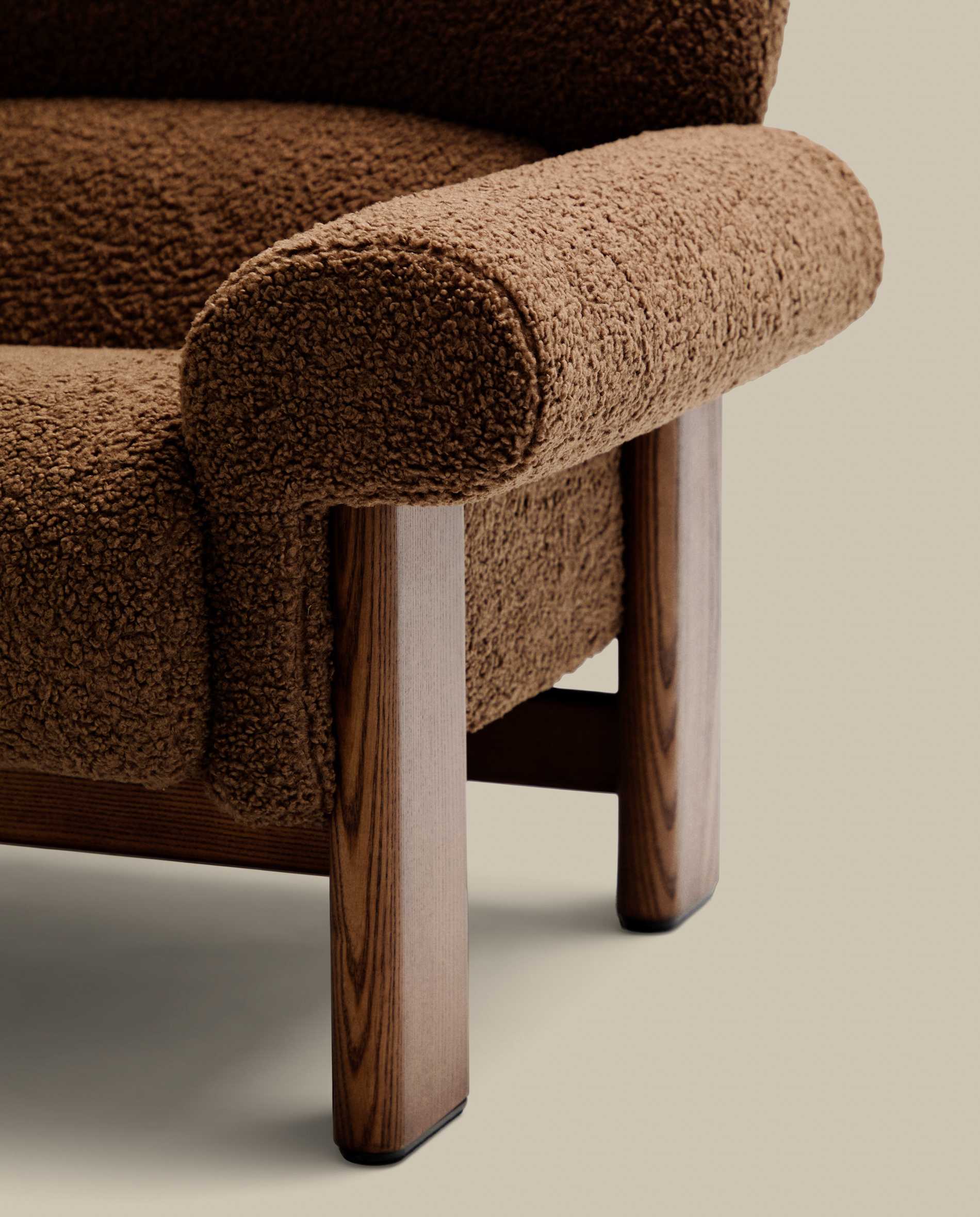 Nema armchair in taupe bouclé with solid ash wood legs in a walnut finish FSC 100%