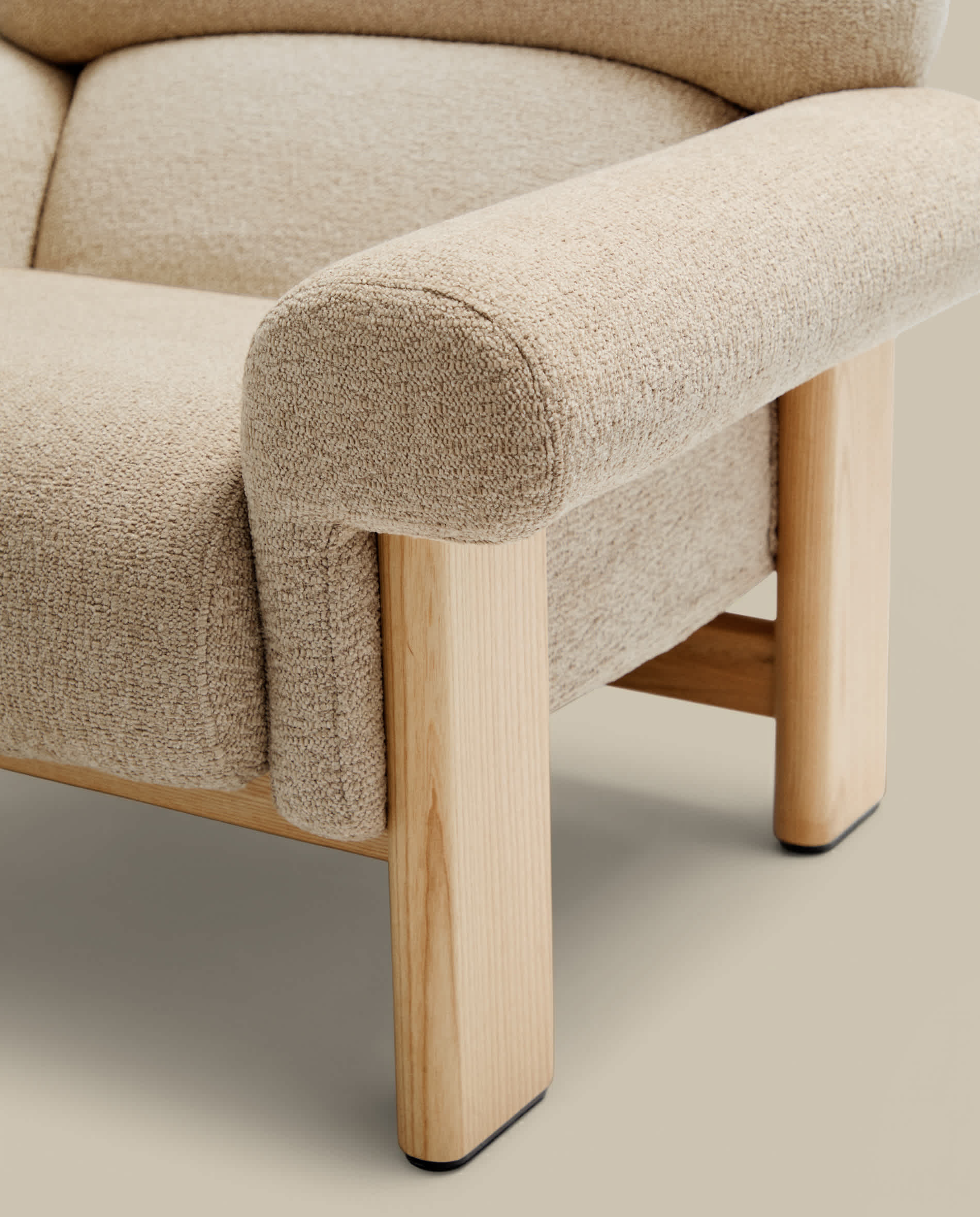 Nema armchair in beige chenille with solid ash wood legs in a natural finish FSC 100%