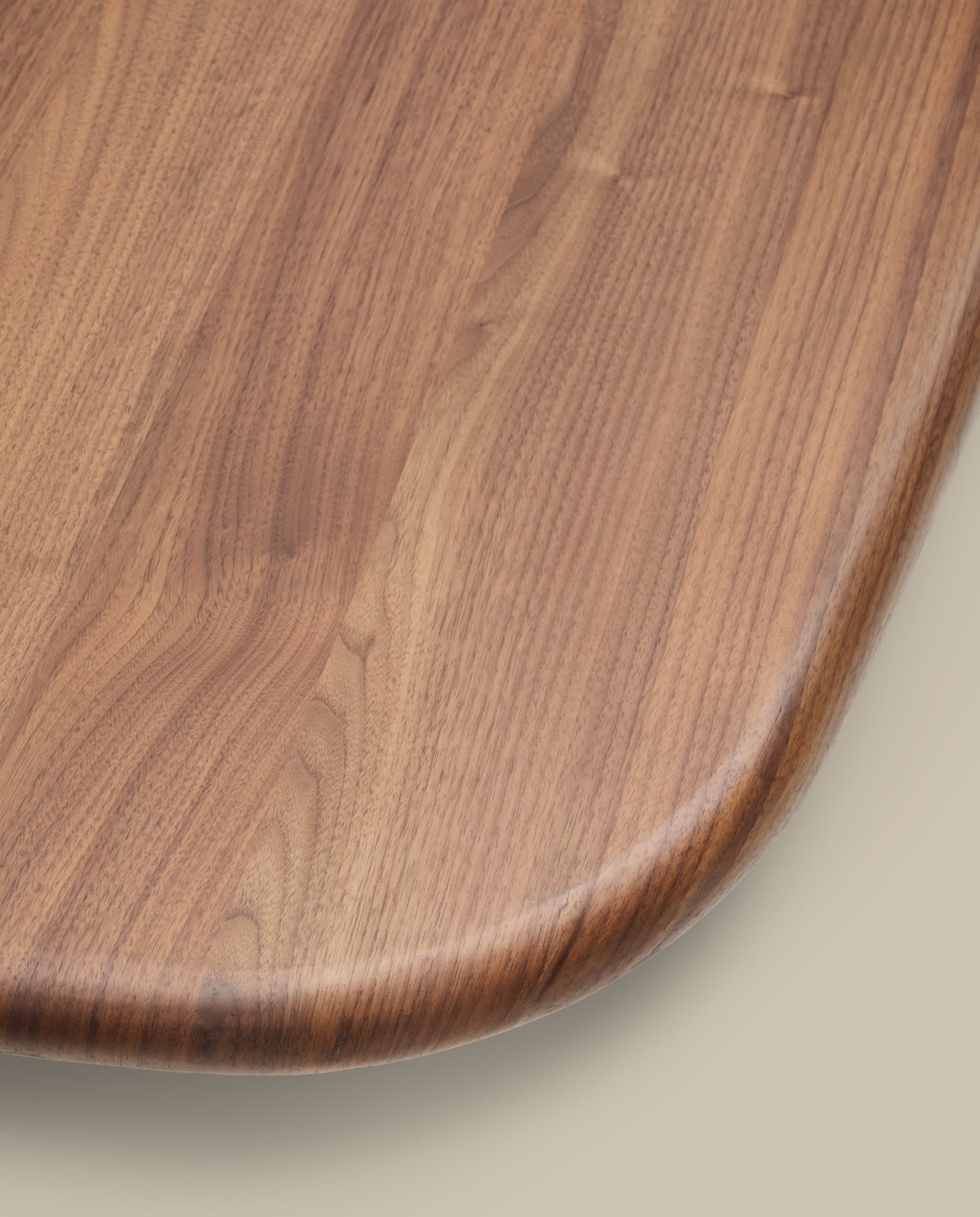 Melvar table made from walnut veneer and legs with brushed stainless steel base 180 x 100cm