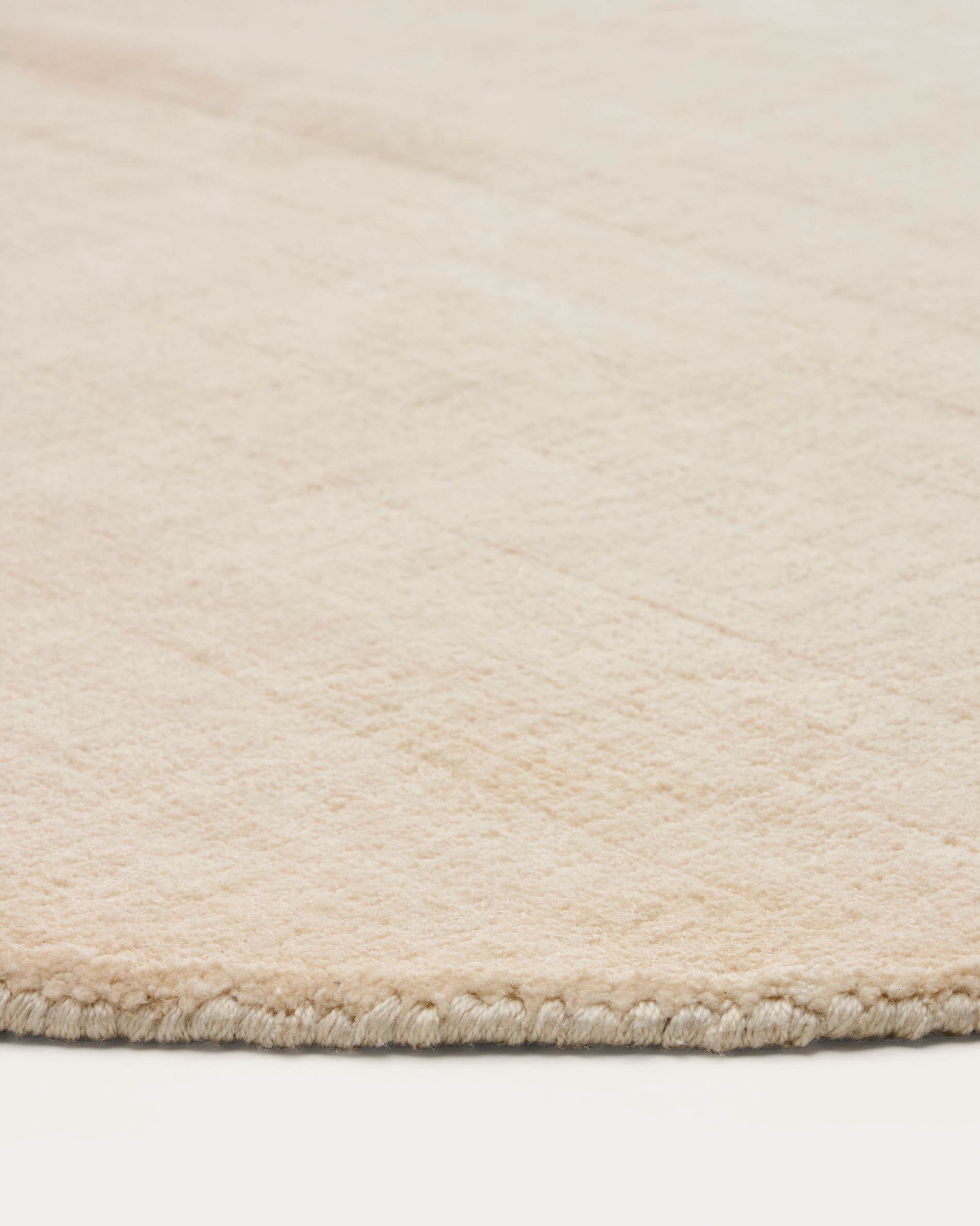 Empuries round rug in ecru Ø200 cm