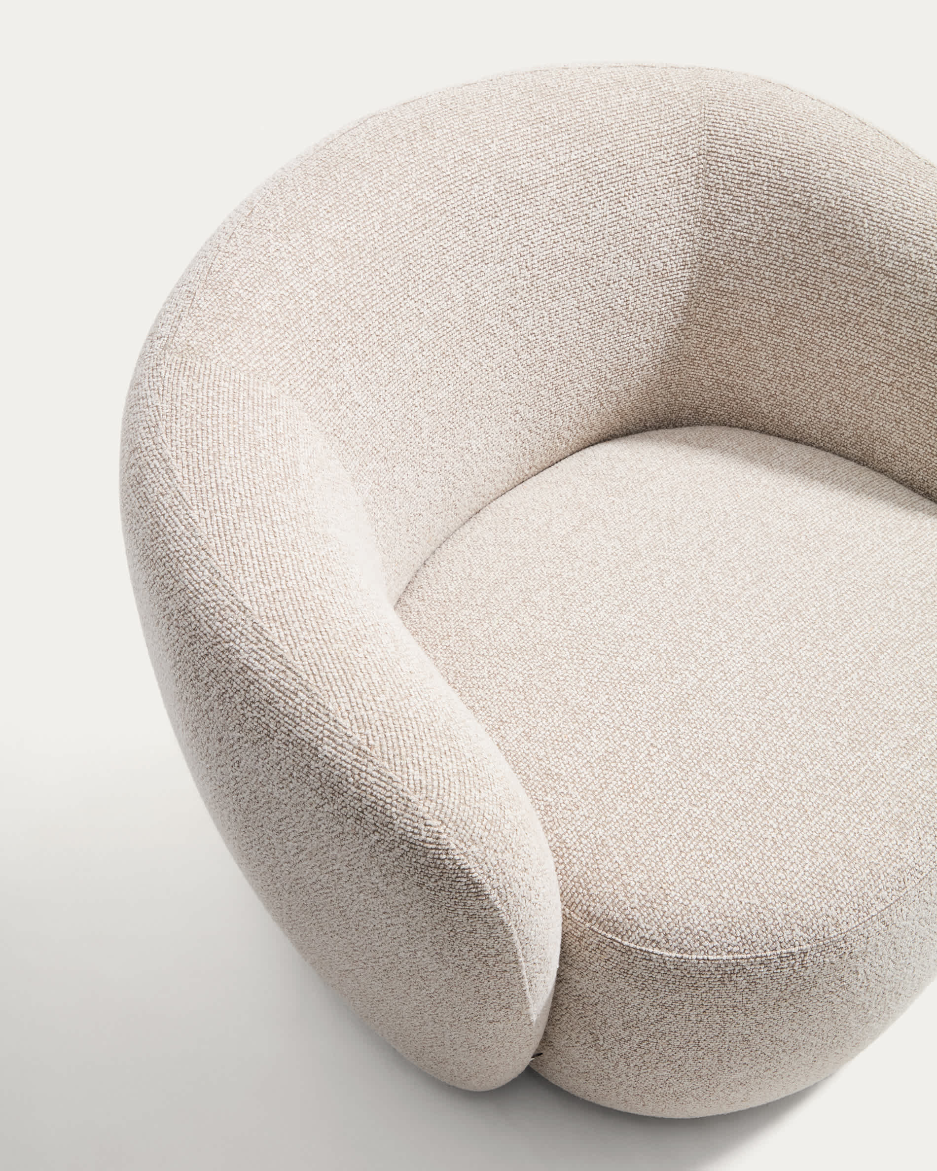 Odenia swivel armchair in beige micro bouclé