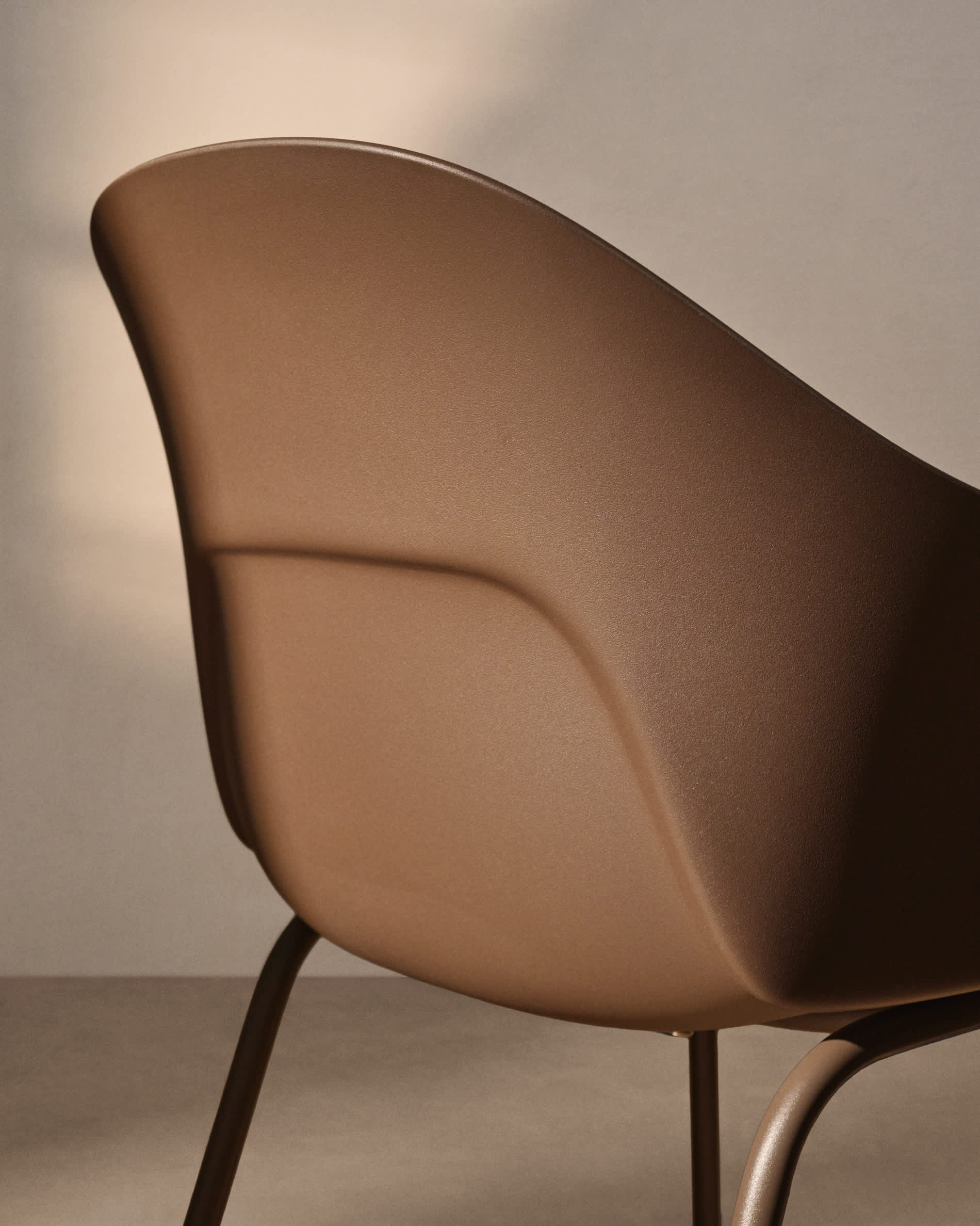 Sanile chair with brown-finish steel legs