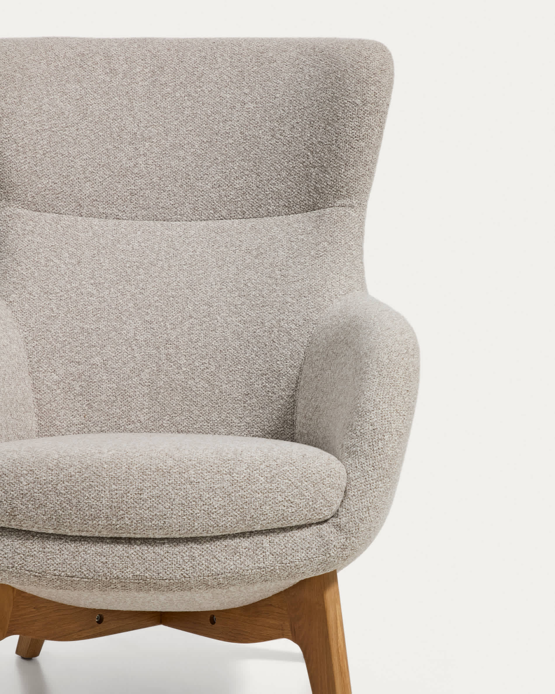 Adiran armchair in beige thick chenille with solid oak wood legs with a natural finish