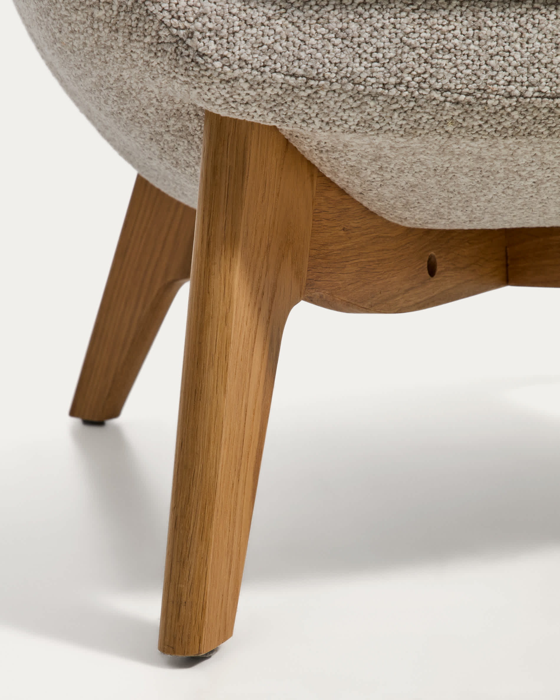 Adiran armchair in beige thick chenille with solid oak wood legs with a natural finish