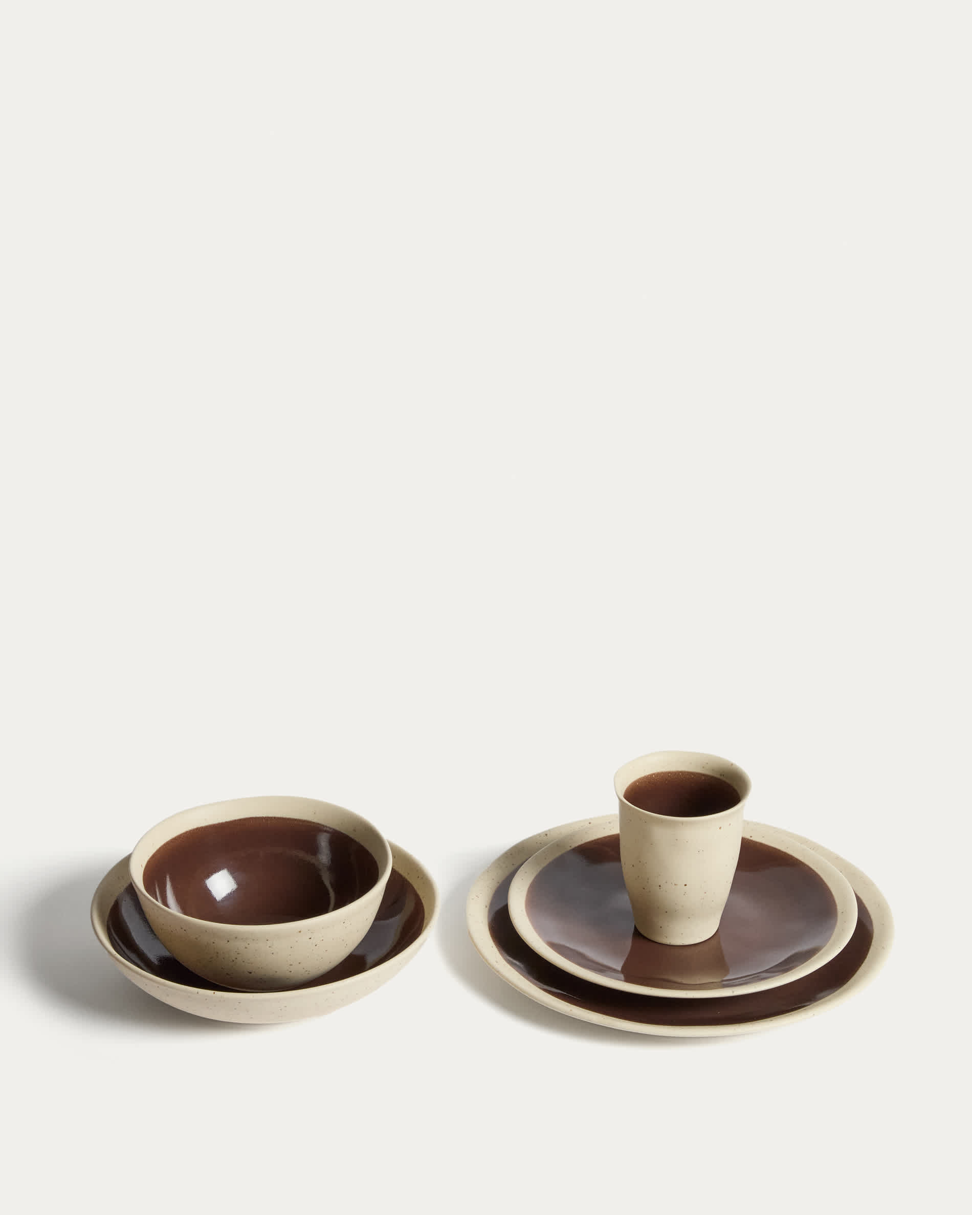 Nale beige ceramic bowl with brown bottom