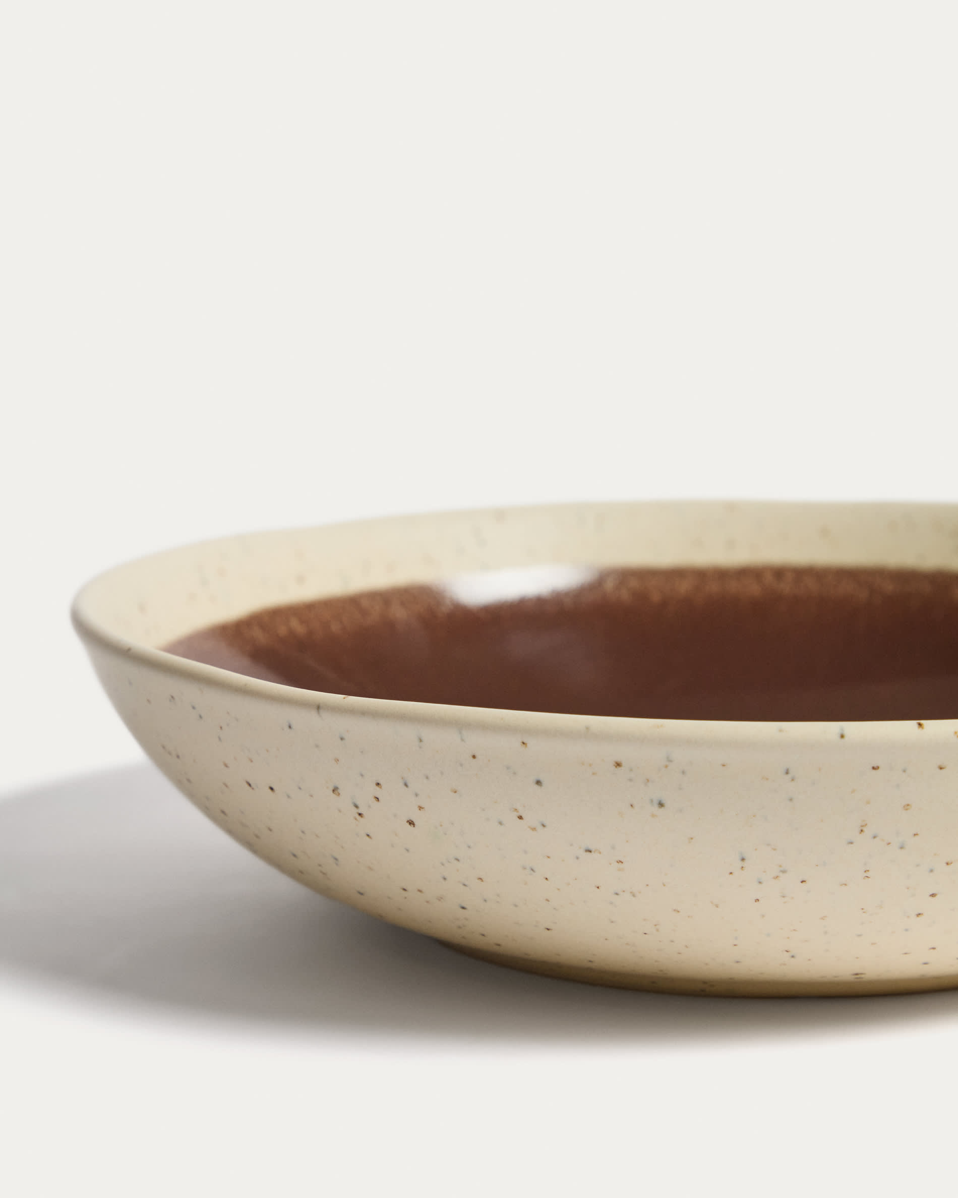 Nale beige ceramic soup bowl with brown bottom