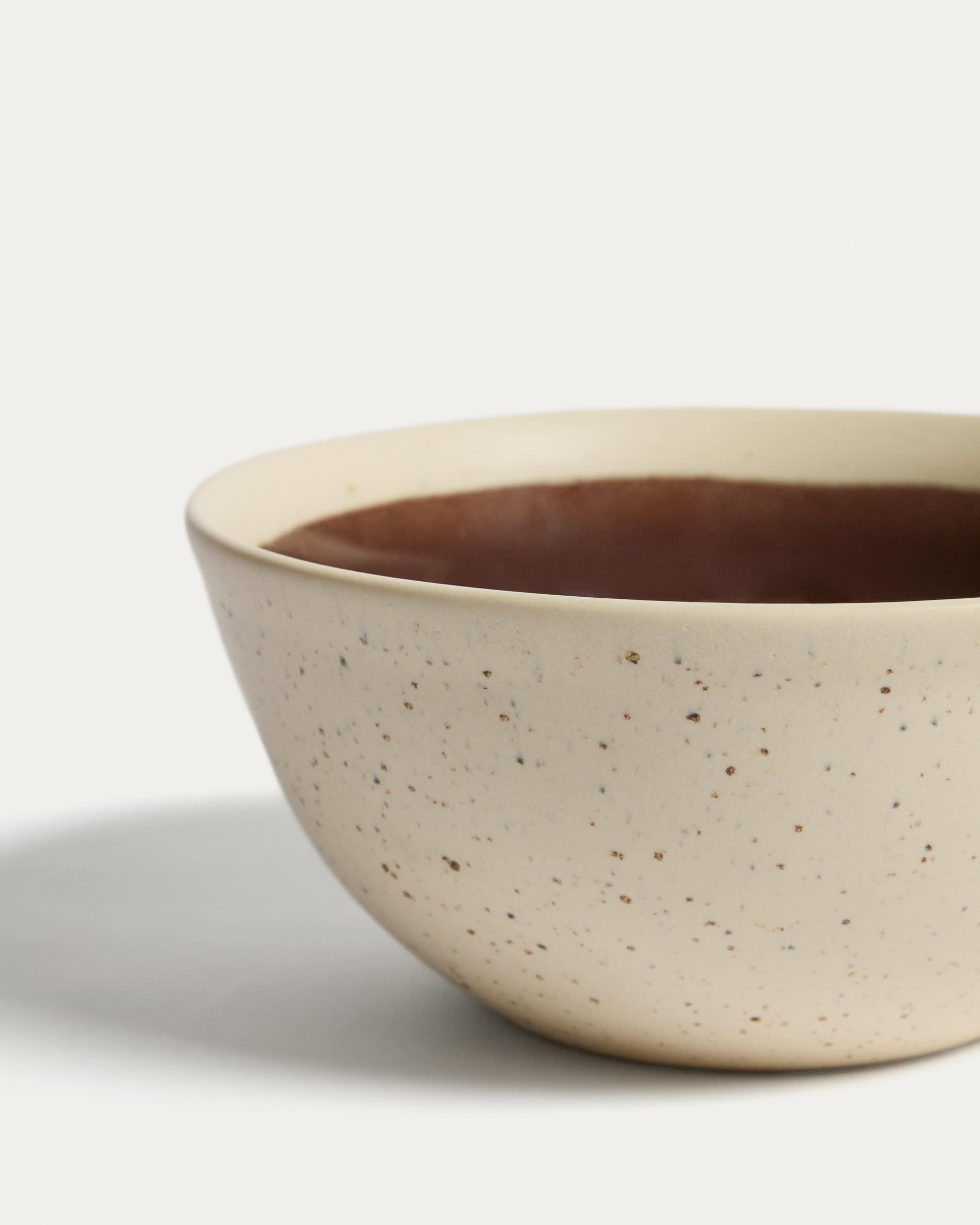 Nale beige ceramic bowl with brown bottom