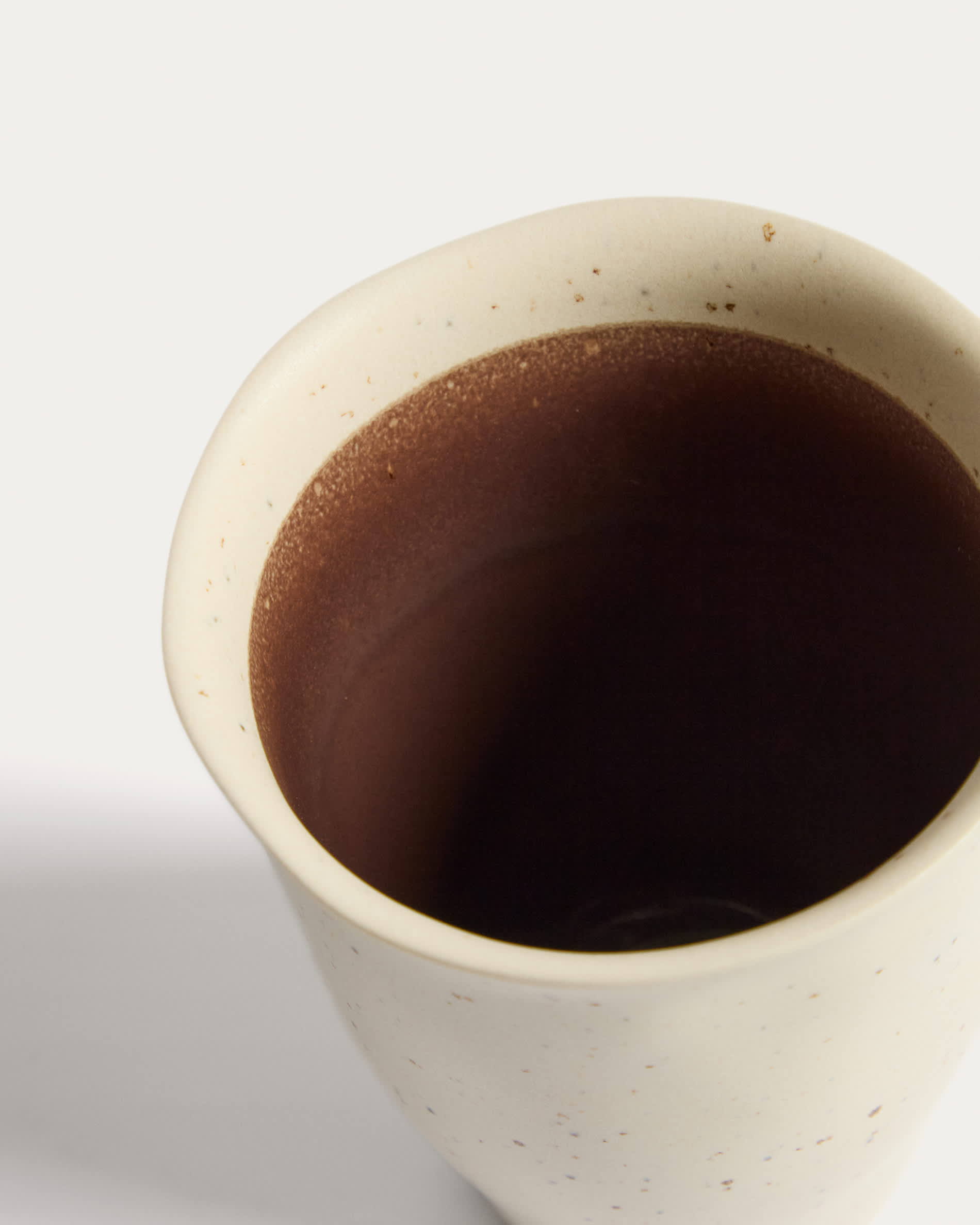 Nale beige ceramic mug with brown bottom