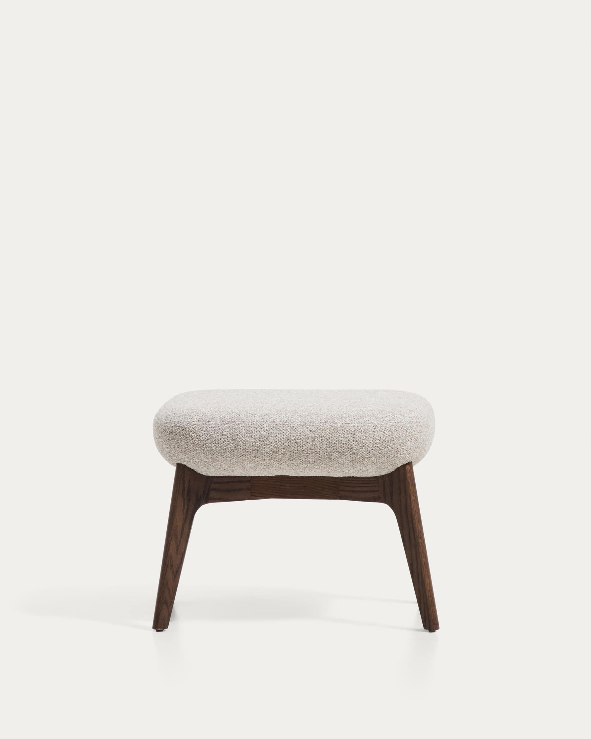 Adiran footrest in beige thick chenille with solid oak wood legs with a walnut finish