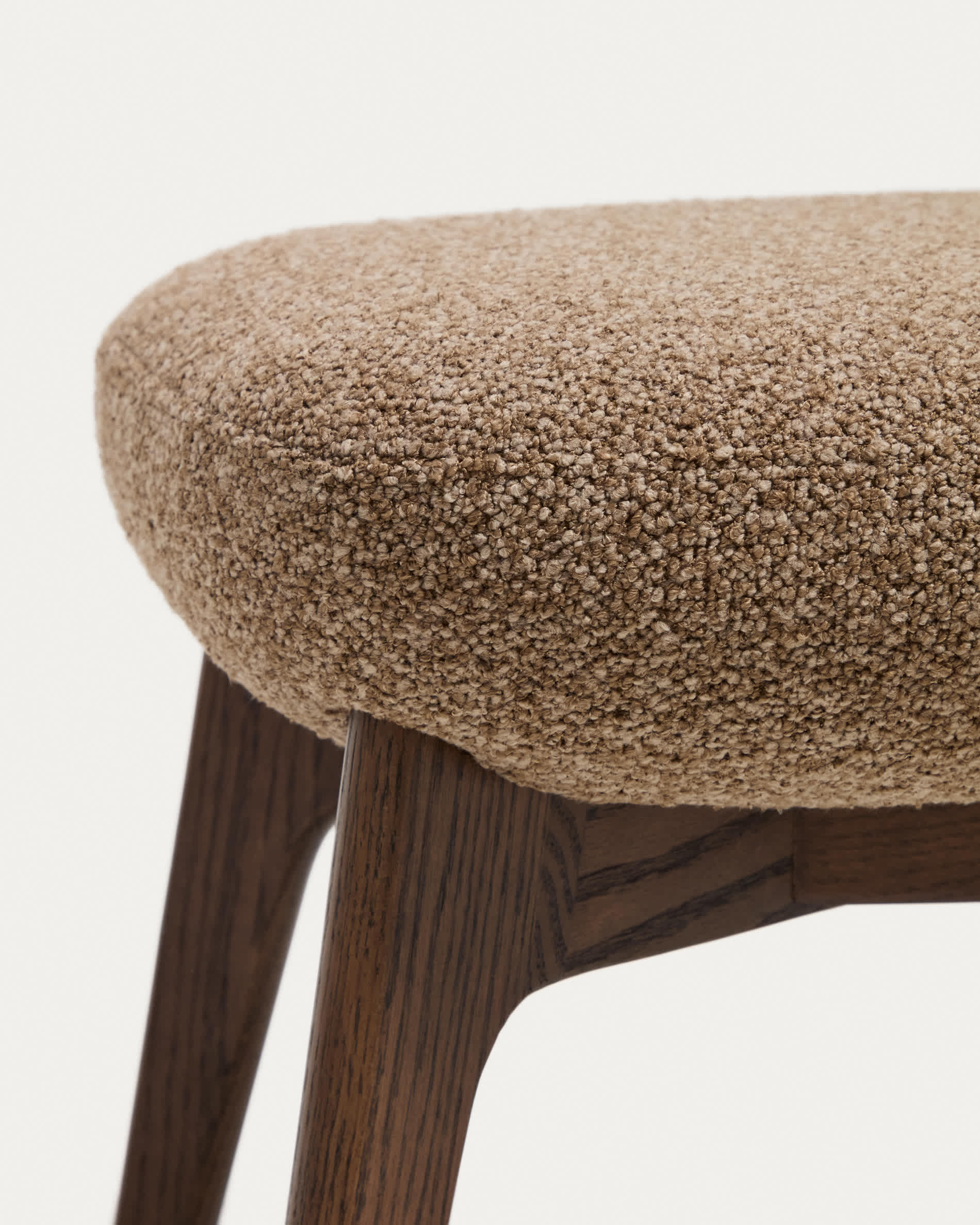 Adiran footrest in light brown thick chenille with solid oak wood legs with a walnut finish