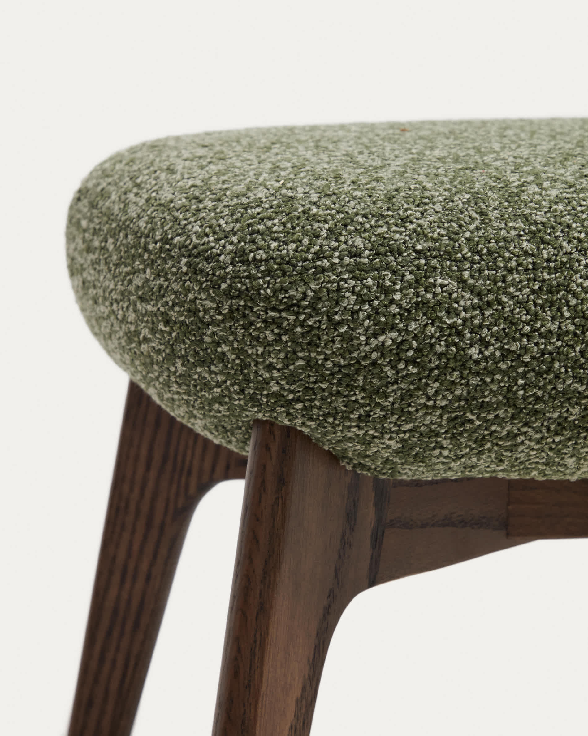Adiran footrest in moss green thick chenille with solid oak wood legs with a walnut finish