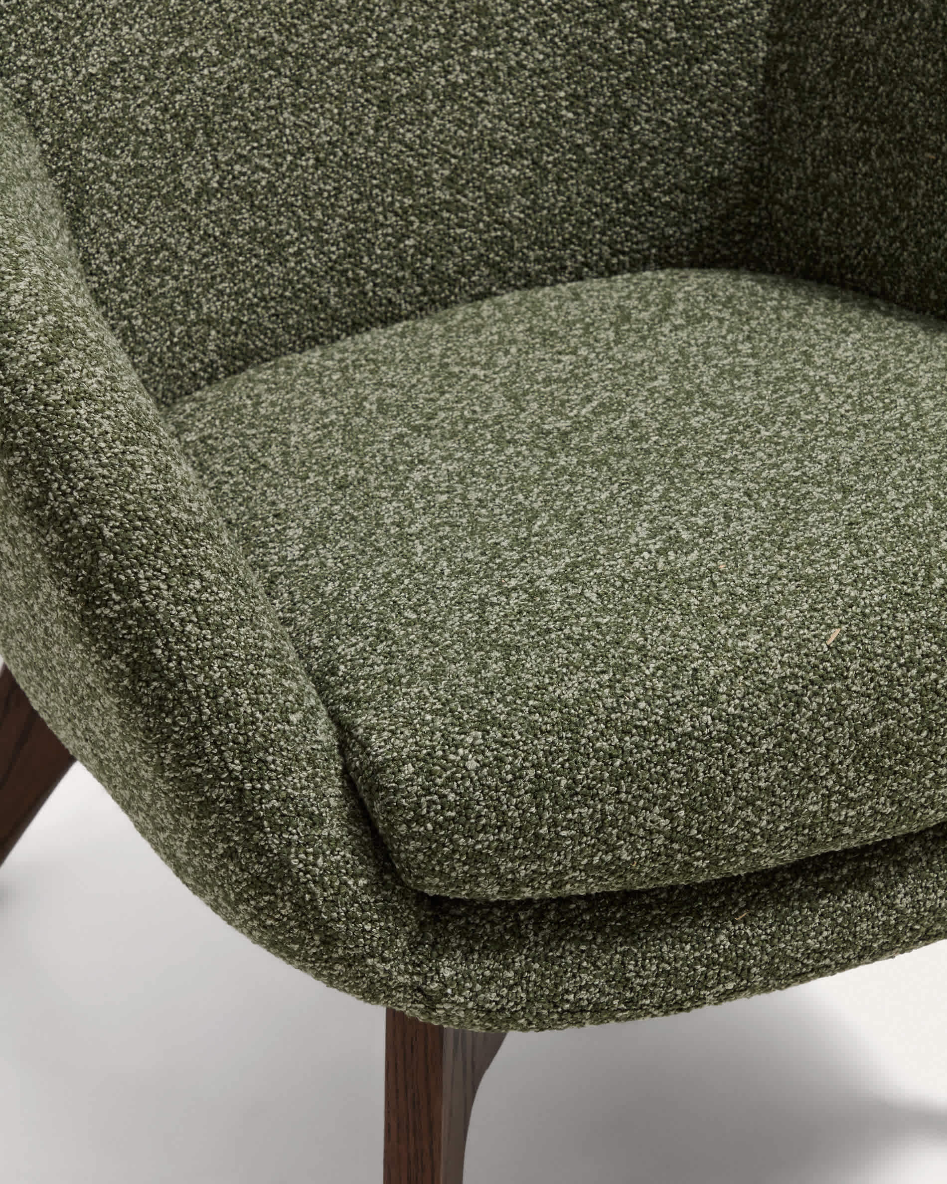 Adiran armchair in moss green thick chenille with solid oak wood legs with a walnut finish