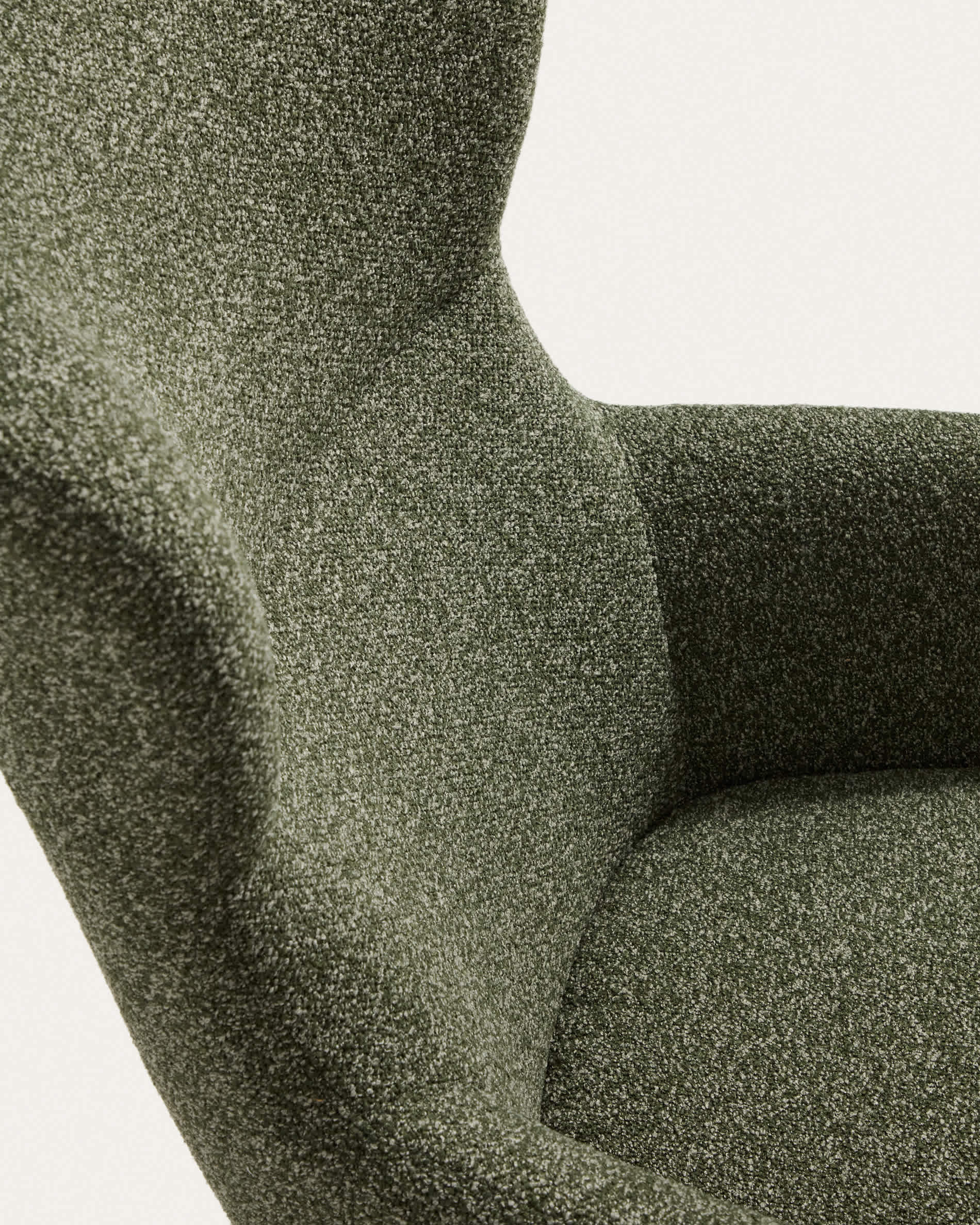 Adiran armchair in moss green thick chenille with solid oak wood legs with a walnut finish