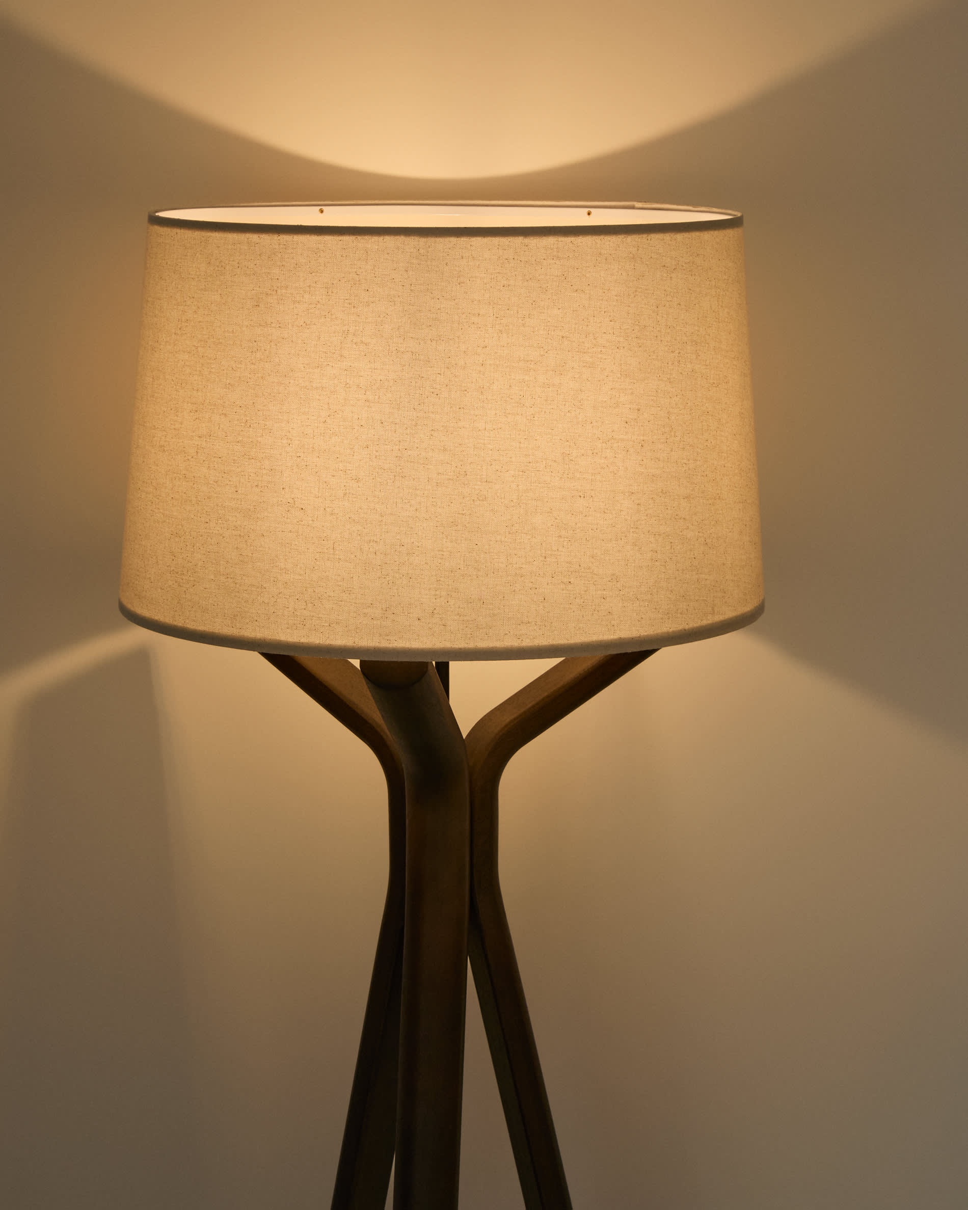 Ubira ash wood floor lamp with dark finish and linen lampshade
