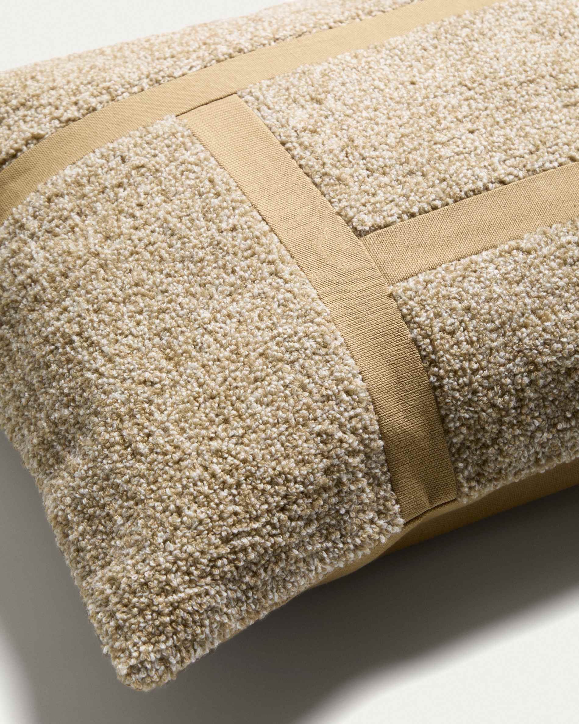Lomel micro bouclé cushion cover with ecru graphic detailing 40 x 60 cm