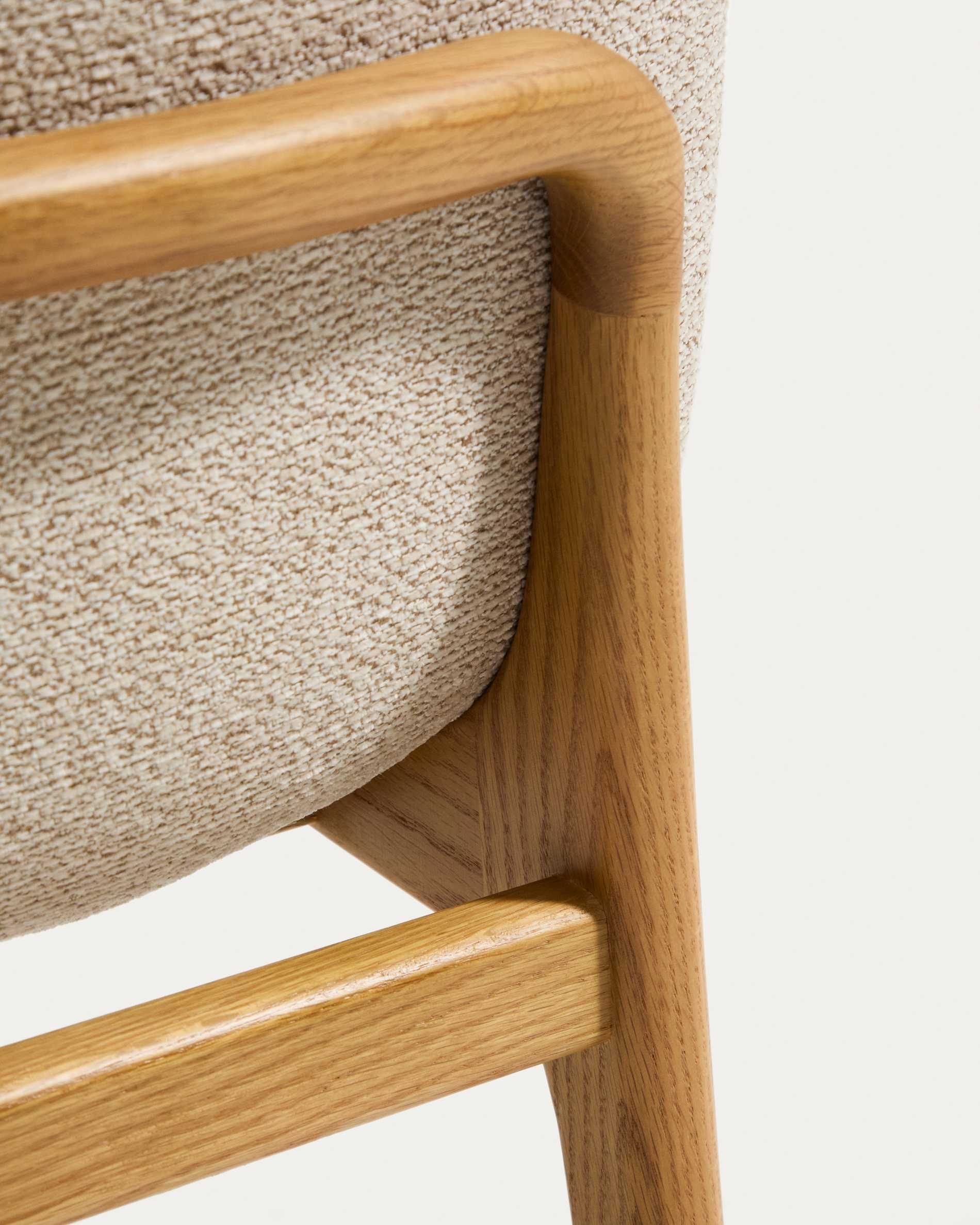Elnor chair in beige chenille with solid oak wood legs in a natural finish