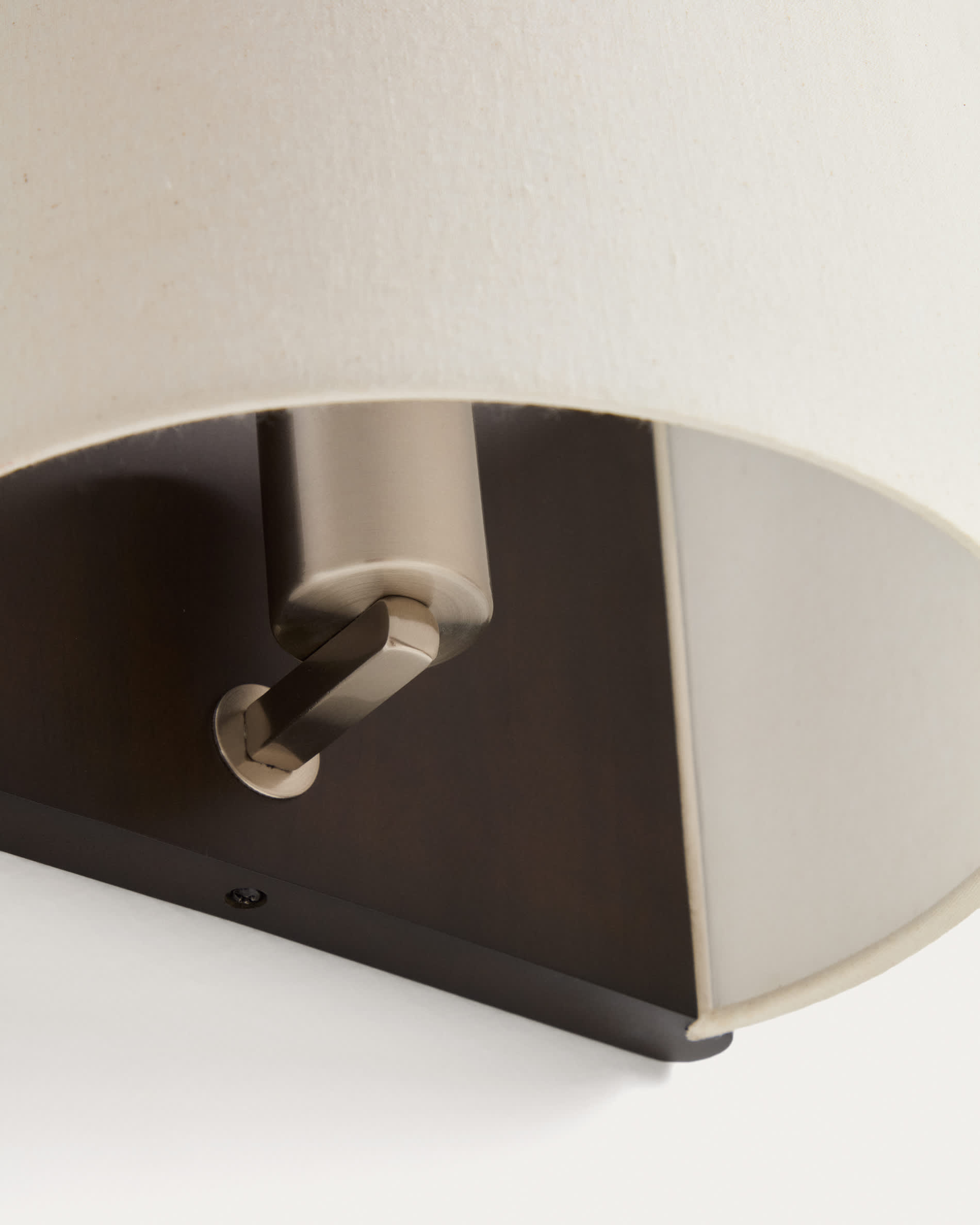Umbran wall-mounted light fixture in dark brown rubberwood and beige linen