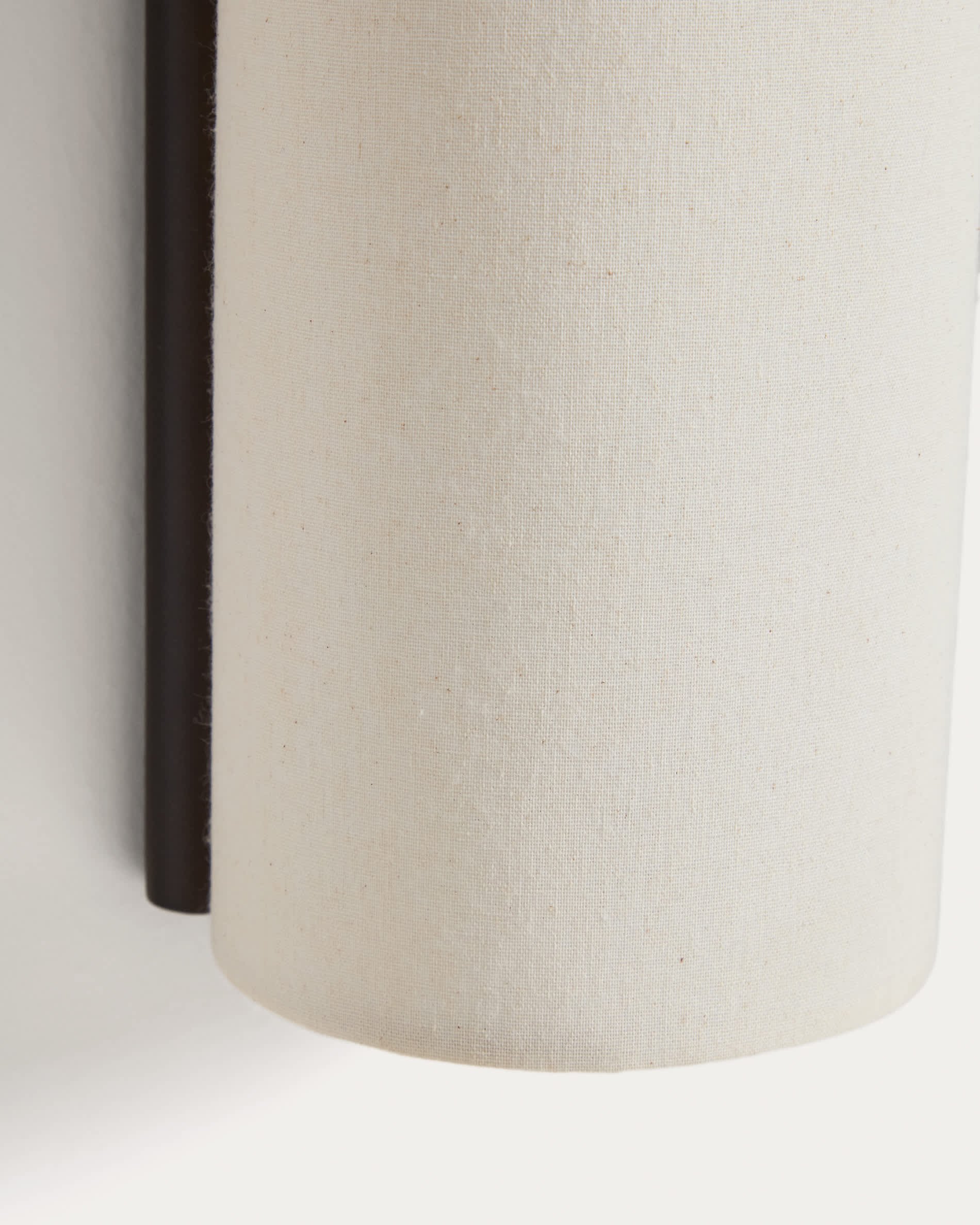 Umbran wall-mounted light fixture in dark brown rubberwood and beige linen
