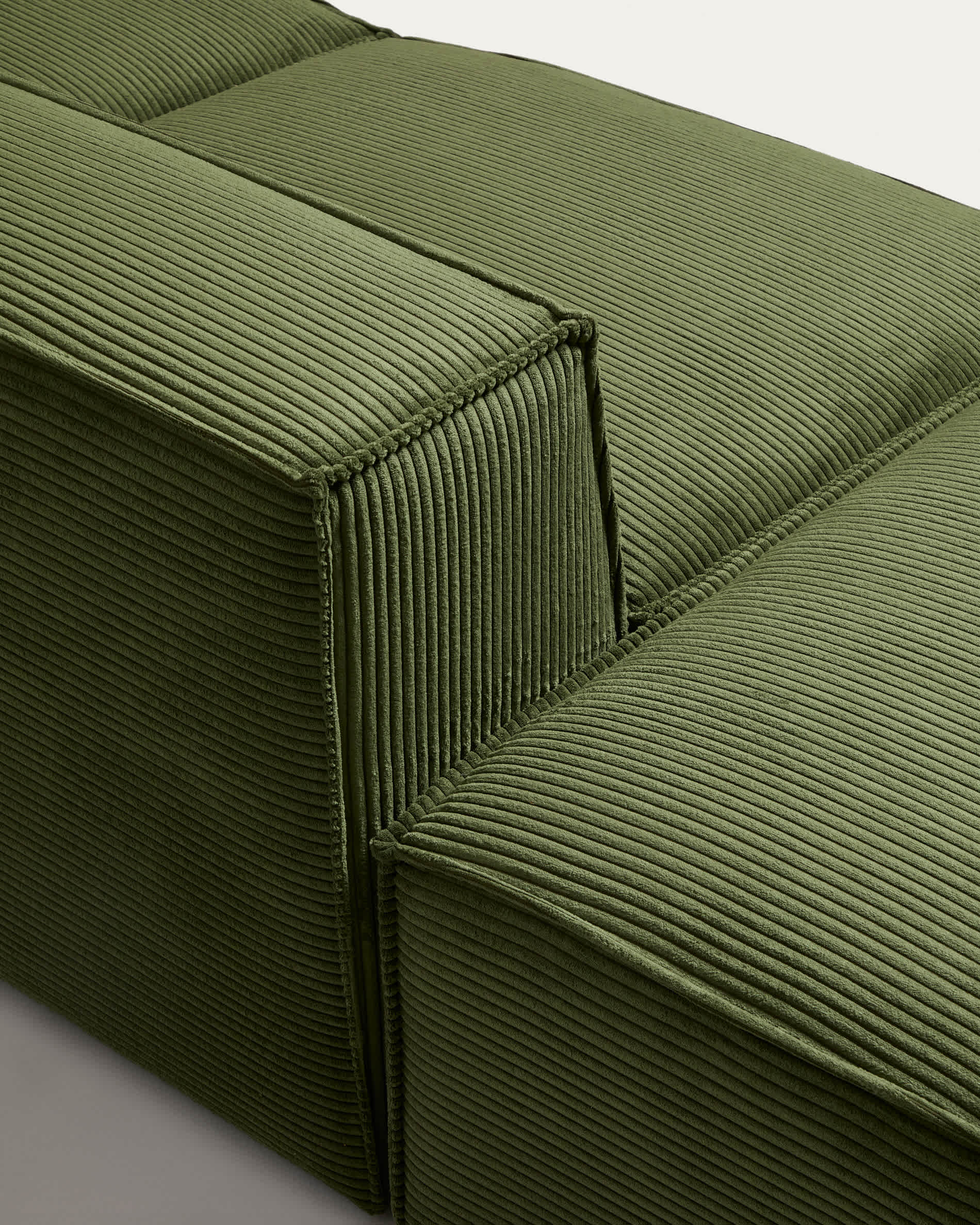 Blok 3-seater sofa with left armrest and end pouffe in thick green corduroy 270cm FSC Mix Credit
