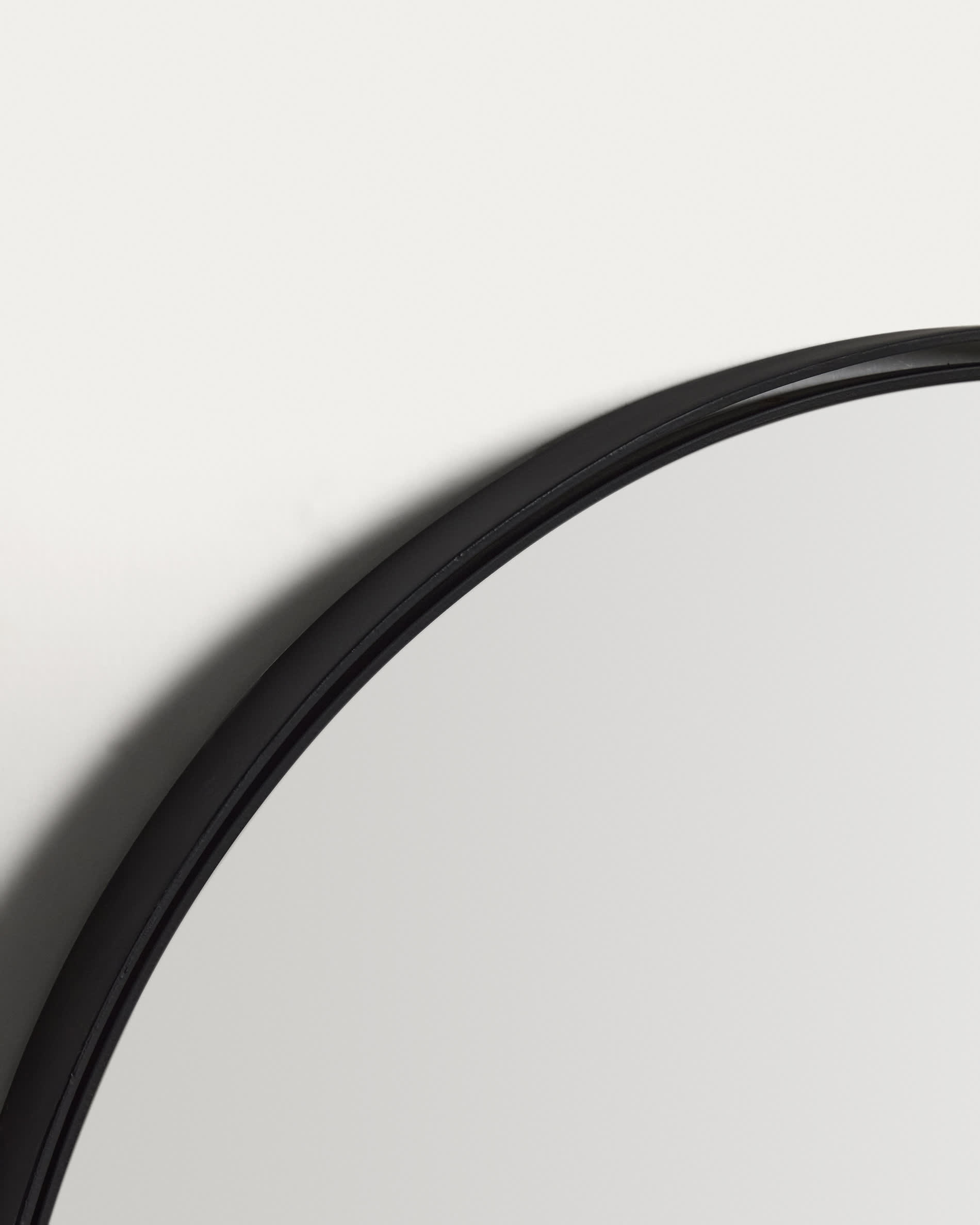 Noral round black metal mirror Ø50cm