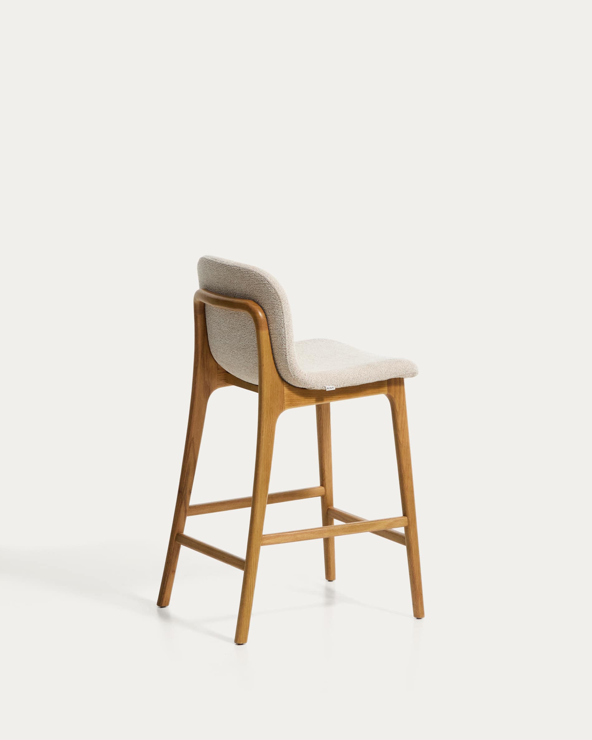 Elnor stool in beige chenille with solid oak wood legs in a natural finish 65cm