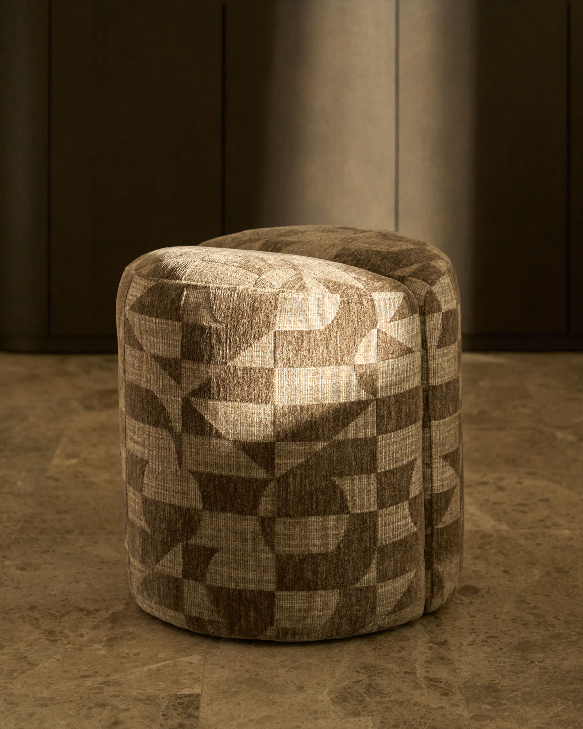 Nedilo round footrest in taupe geometric FSC Mix Credit jacquard fabric