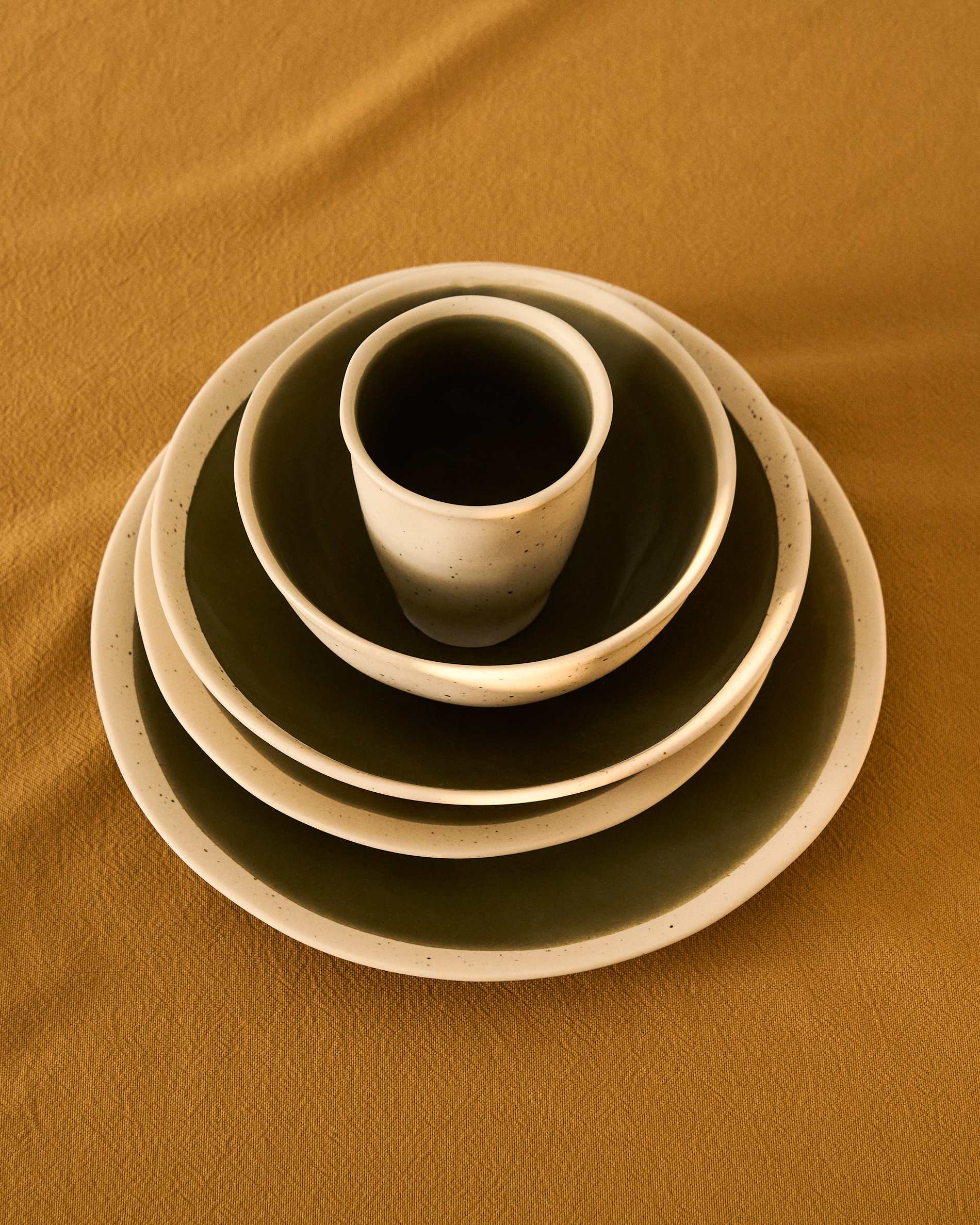 Nale beige ceramic soup bowl with green bottom