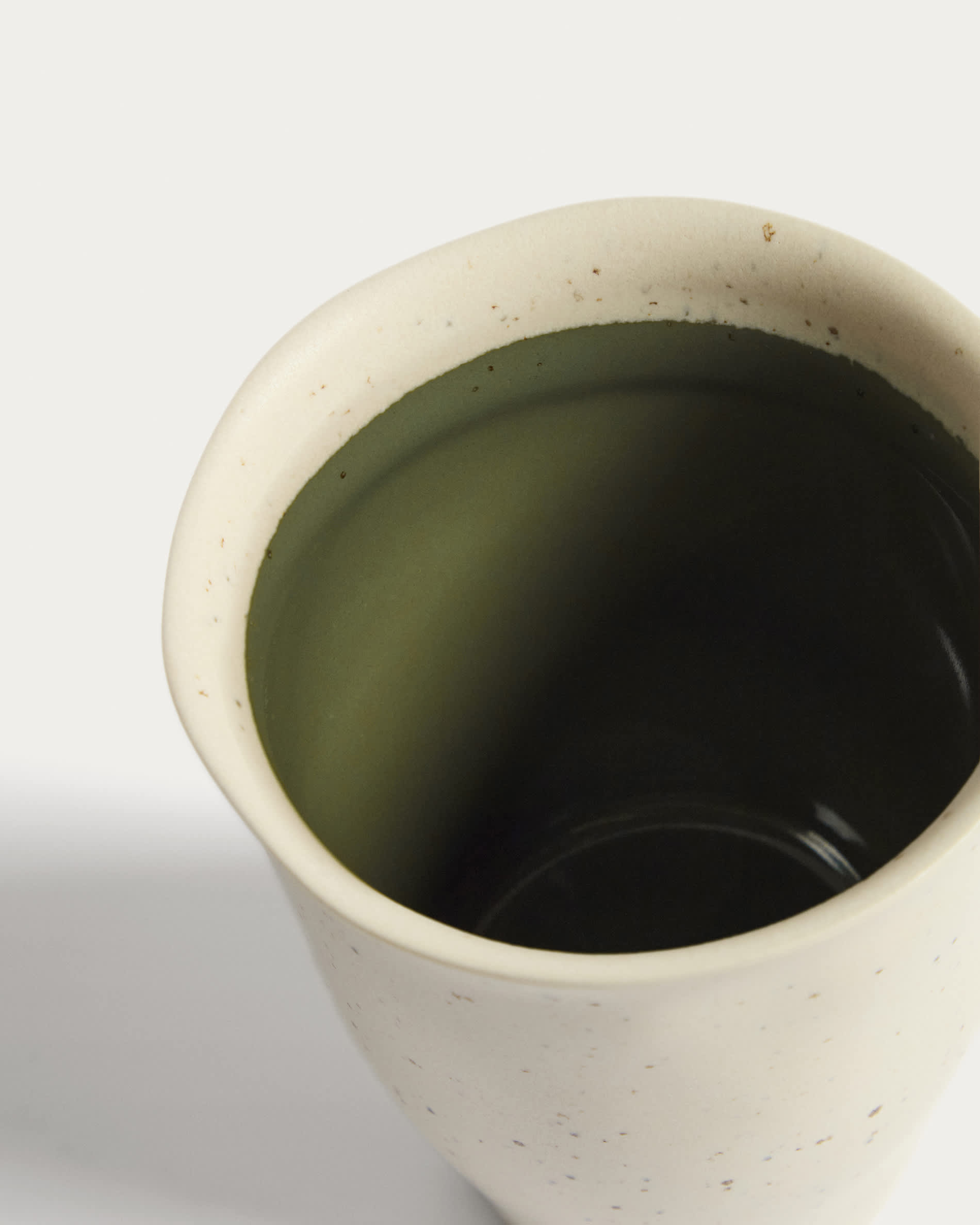 Nale beige ceramic mug with green bottom