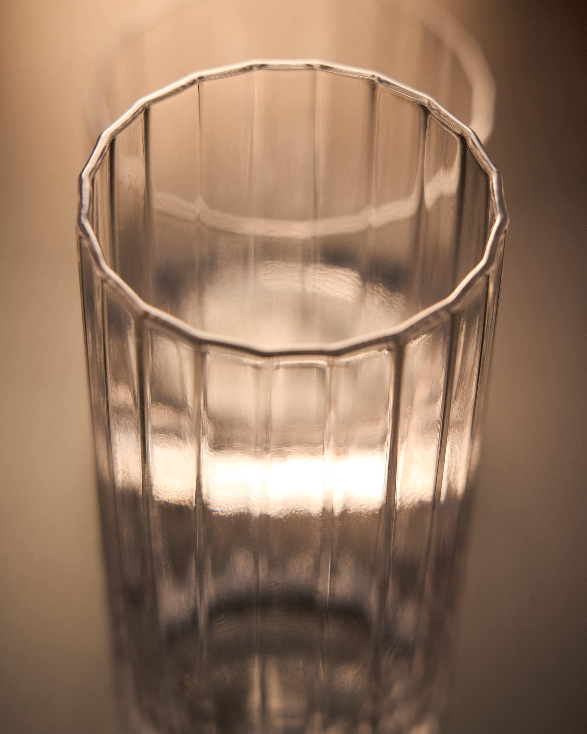 Nivor clear drinking glass with carved vertical relief, 30 cl