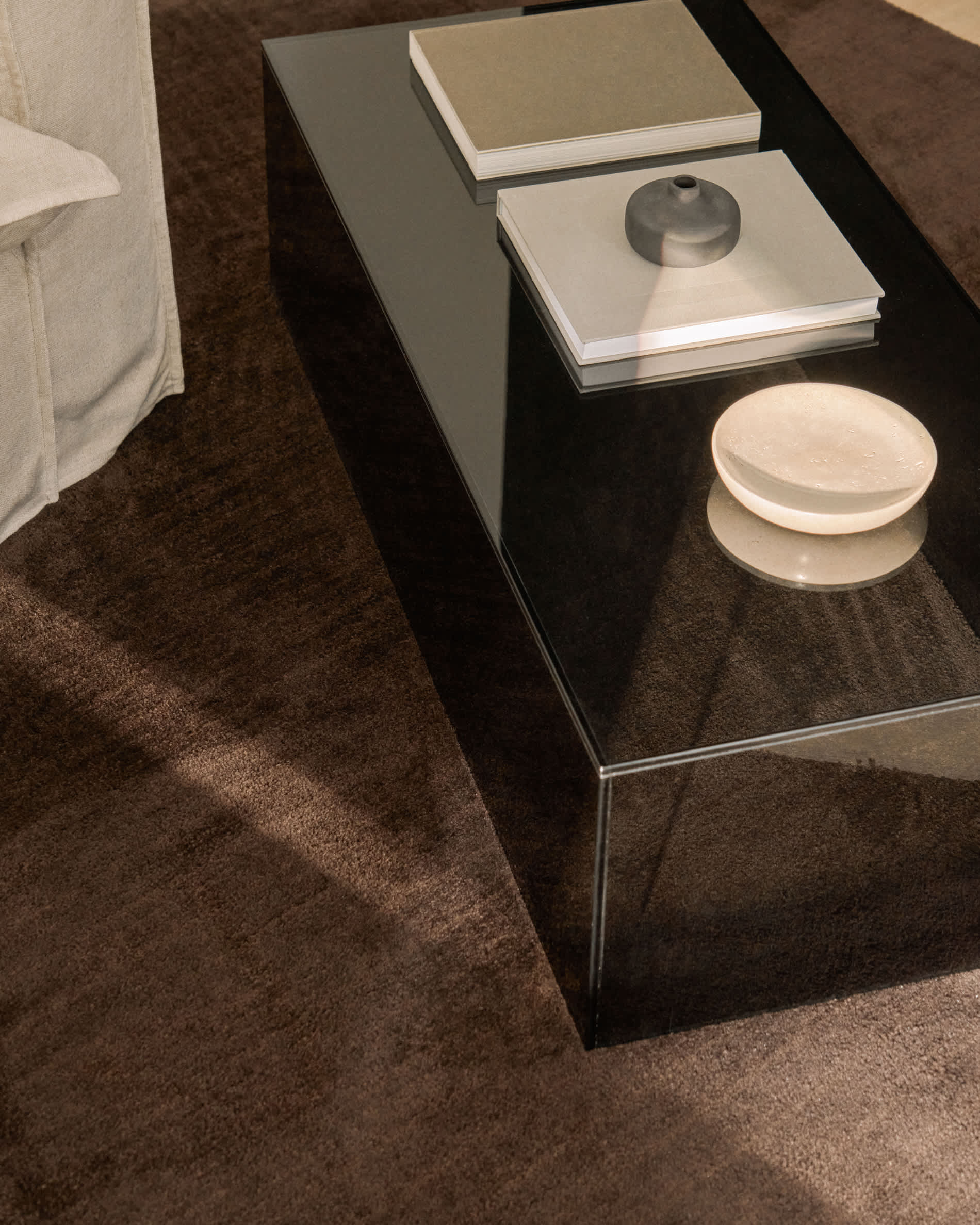 Orlia coffee table in dark grey tempered glass 110 x 50cm