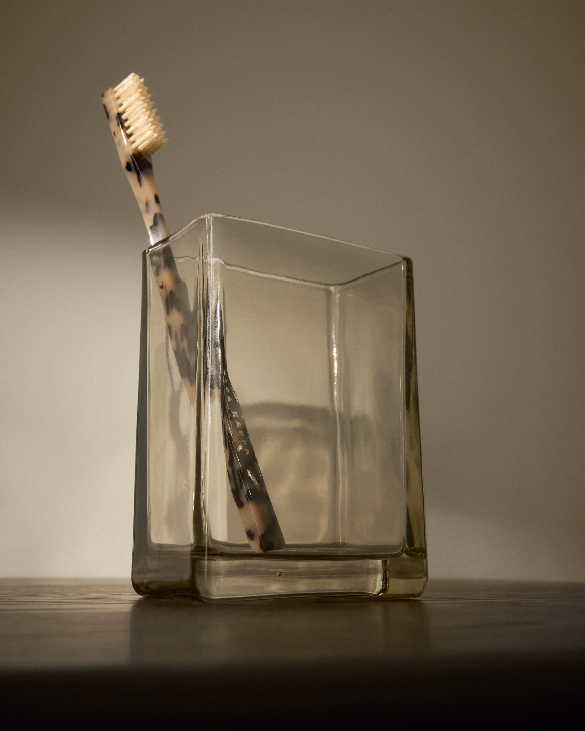 Meris light brown translucent glass toothbrush holder