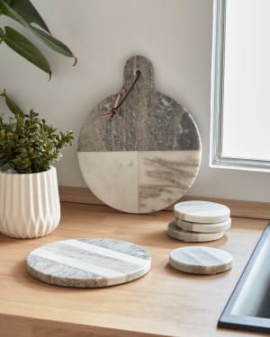 Xamila large round serving board in multicoloured marble