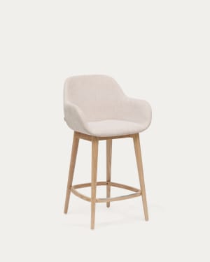 Konna stool in beige and solid ash wood legs in a light finish, 65 cm