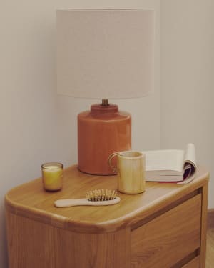 Daeli ceramic table lamp with orange finish and beige cotton