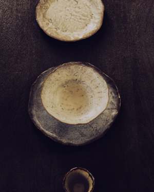 Alenia deep plate in brown ceramic