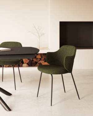 Yunia chair in green wide seam corduroy and steel legs in a painted black finish FSC 100%
