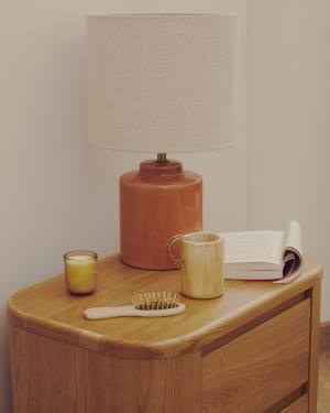 Daeli ceramic table lamp with orange finish and beige cotton