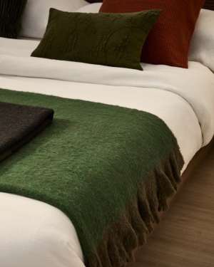 Odelna wool and acrylic throw with ruffles in green 130 x 170 cm
