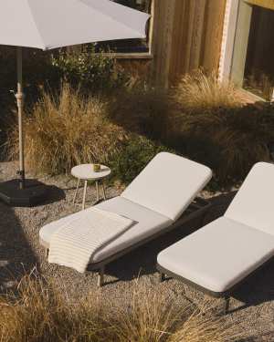 Kionia taupe aluminium sun lounger.