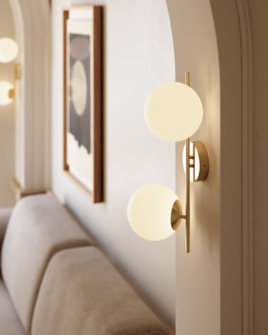 Mahala steel wall light with brass finish and two frosted glass spheres