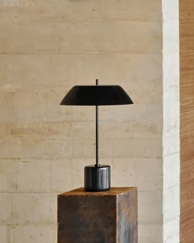 Sayra table lamp made of black marble and metal in a black painted finish