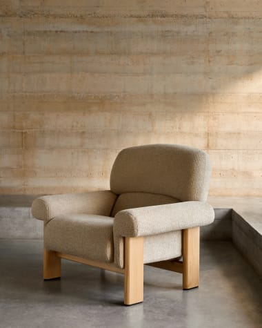 Nema armchair in beige chenille with solid ash wood legs in a natural finish FSC 100%